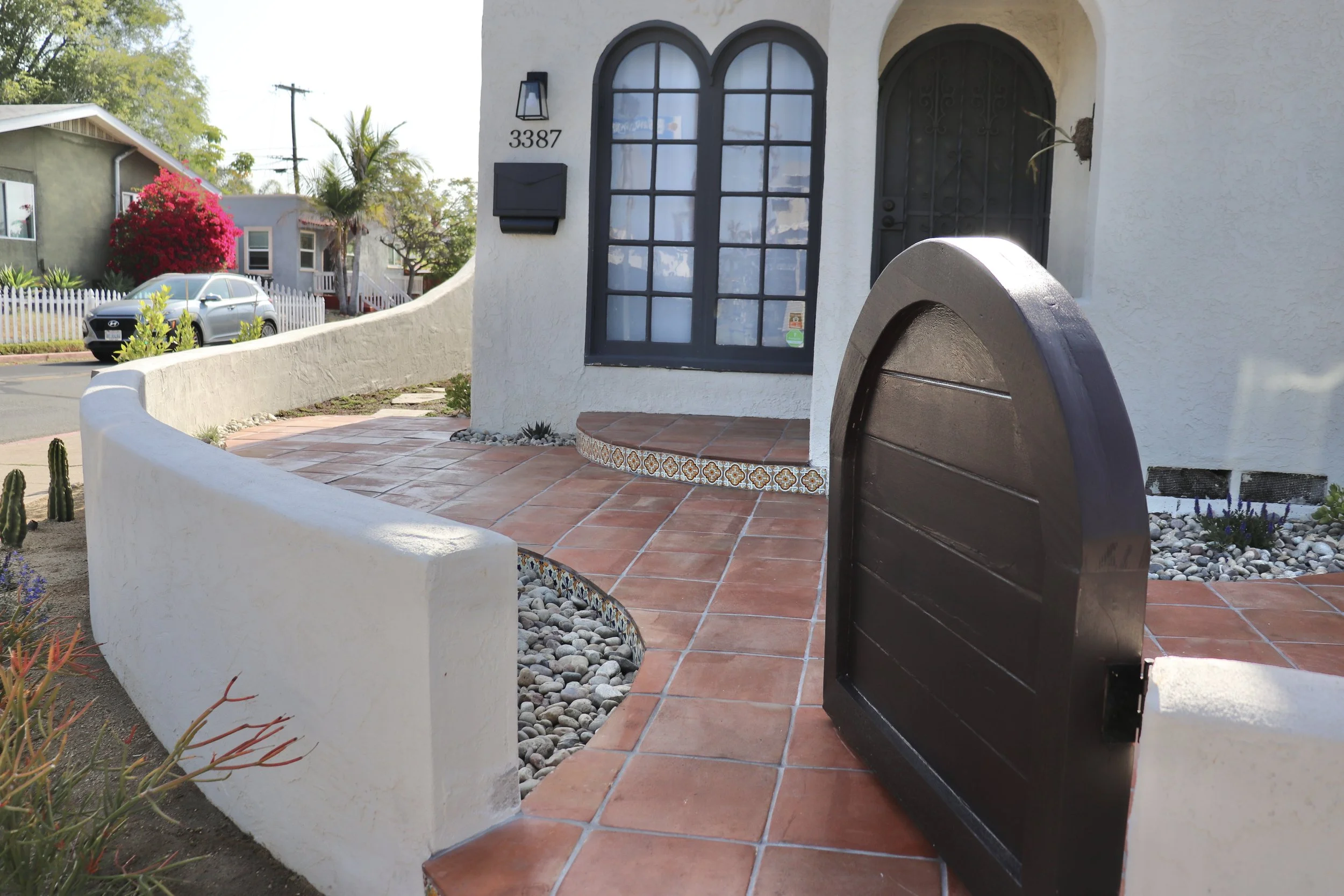 Spanish style front gate with Spanish tiles