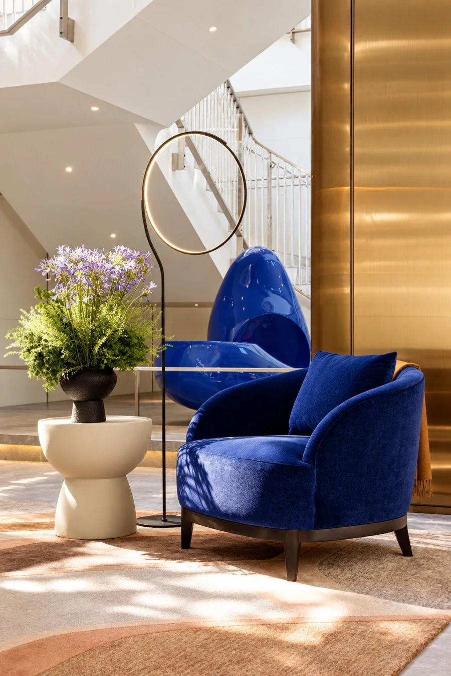 Sunlit-Atrium-Lounge-with-Cobalt-Chair-reduced-size.jpg