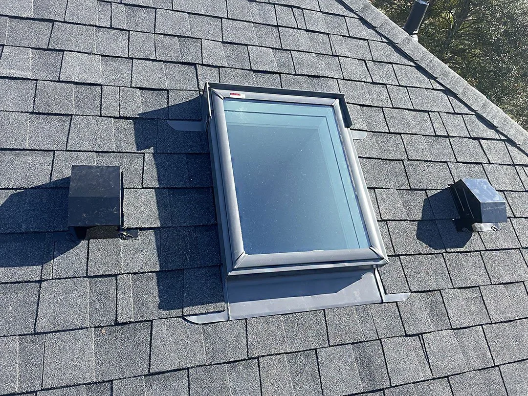 Country View Builders installing a Velux skylight to bring natural light into a home during a full roof replacement in Woodbine, Maryland
