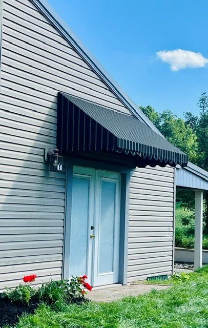 Welded Rigid French Door Awning.jpg