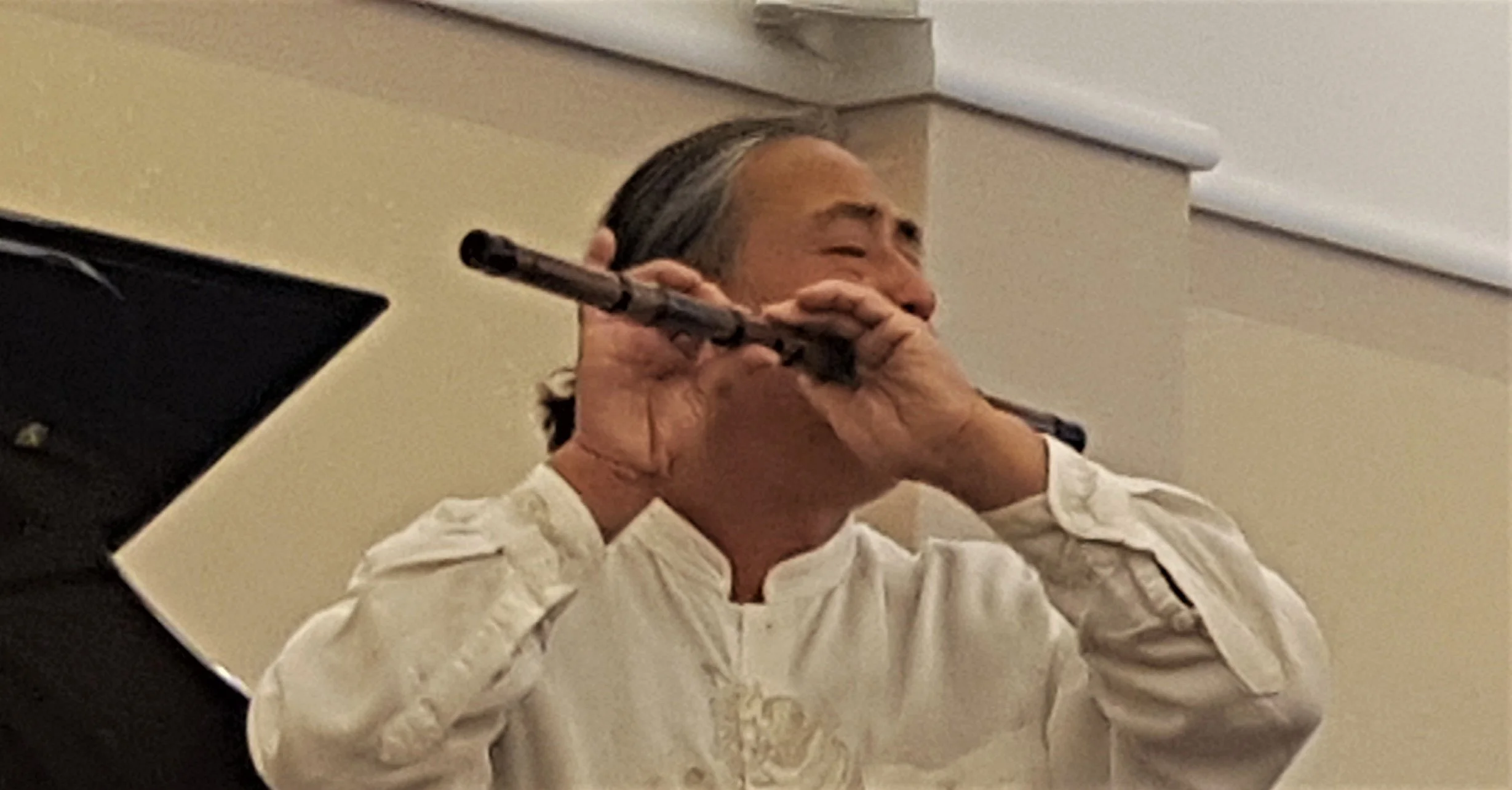 ‘On the rubble of my home I played my flute’ - Guo Yue