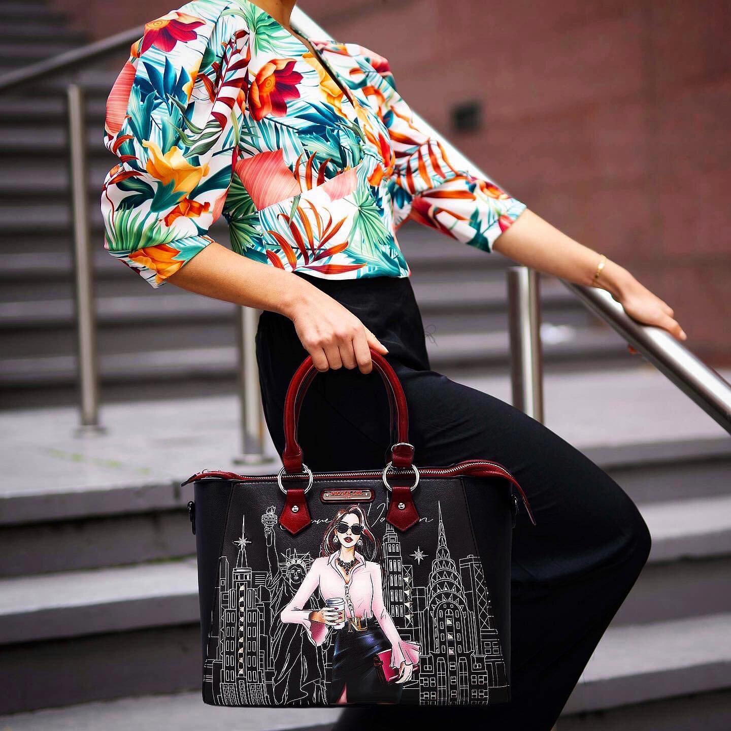 ✨CAREER WOMAN COLLECTION✨ The perfect statement bag, our Career Woman satchel has radiant embellishments and a showstopping laser-cut city skyline design🗽🌆😍 Tap the photos to see prices! Visit our official website nicoleleeonline.com/collections/n