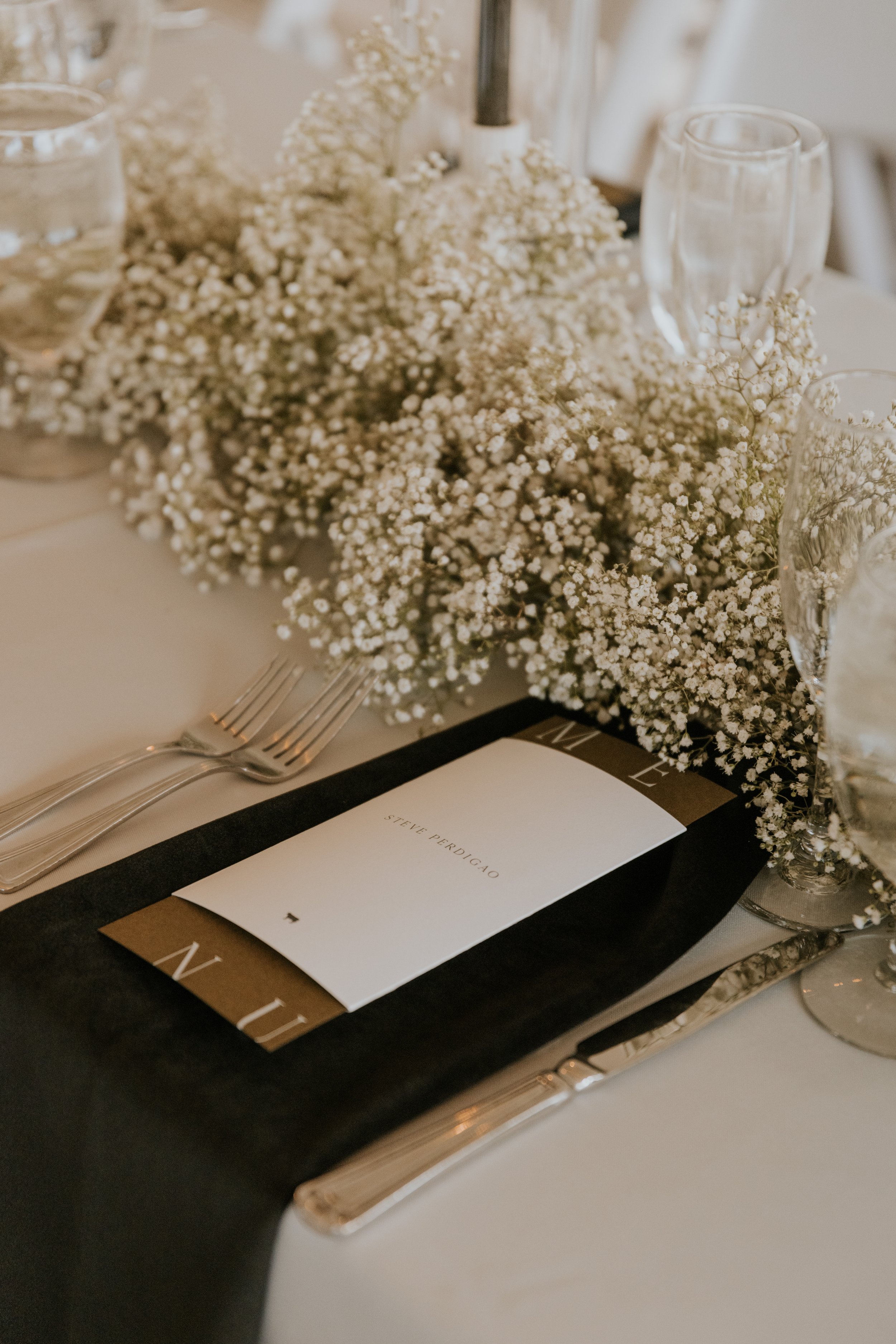 wedding tablescape with all white accents at Emmy & Dick's Chic, Sophisticated Black-Tie Vail Wedding