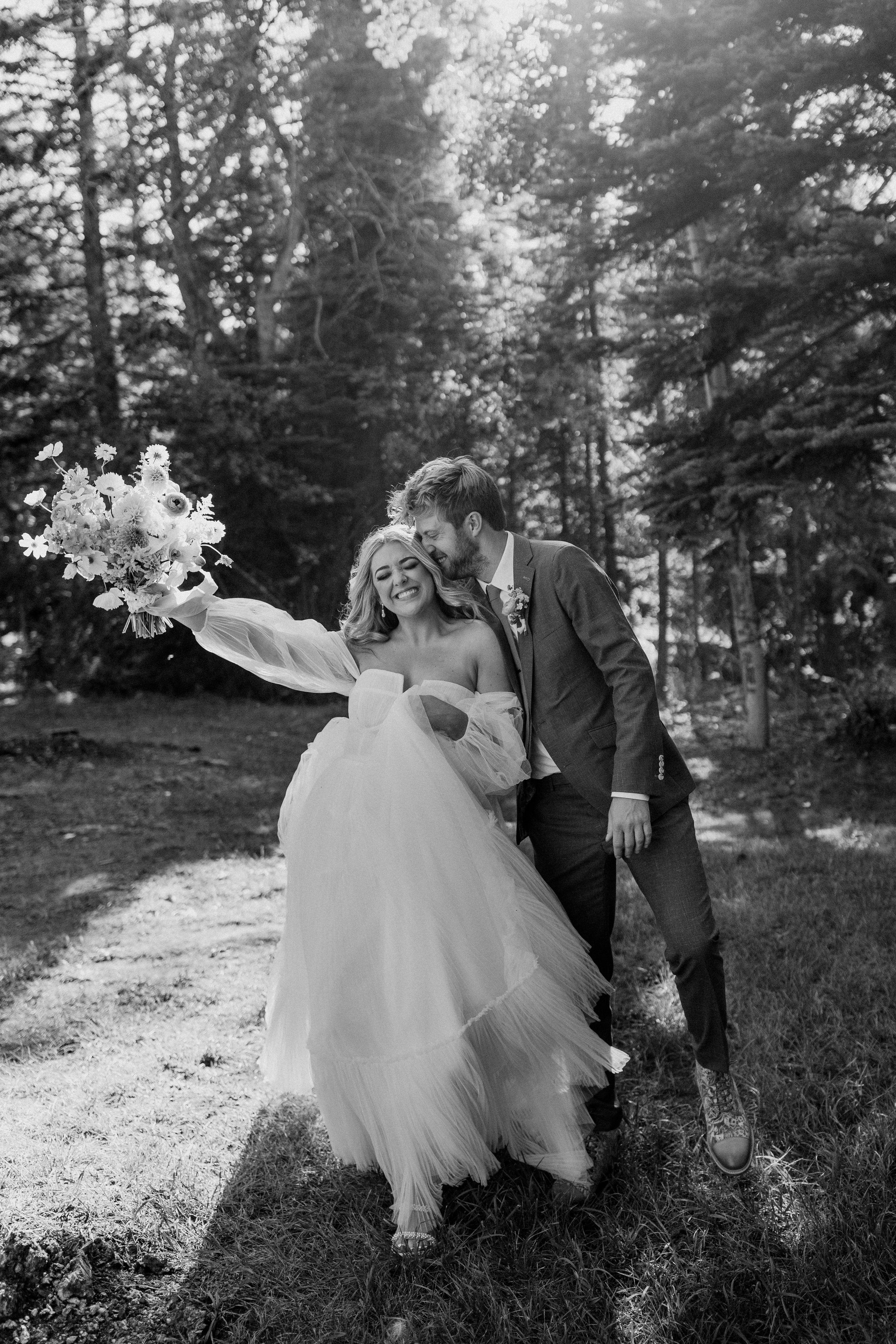 bride and groom at their wedding with a colorful wedding palette