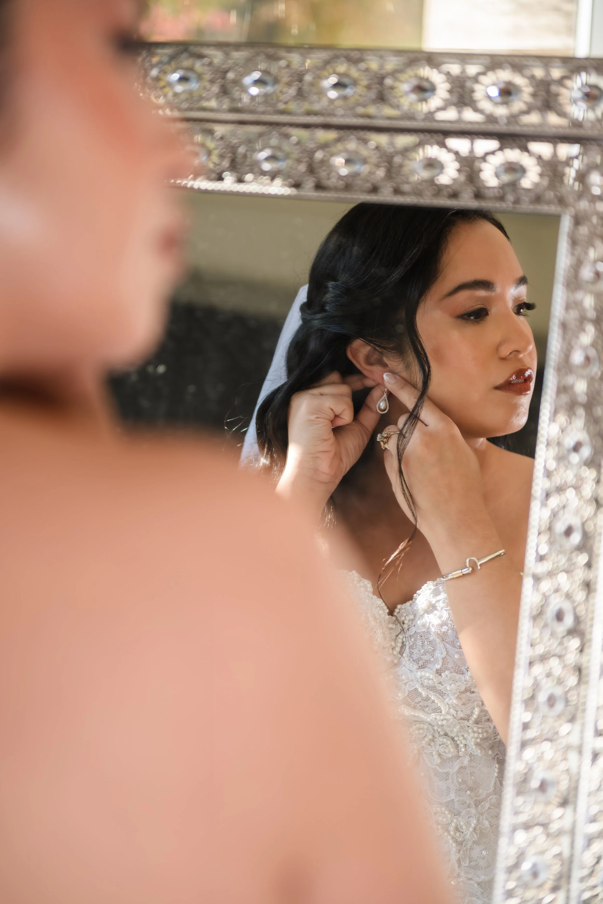 Bride getting ready at the Queen's Botanical Garden in Flushing, New York