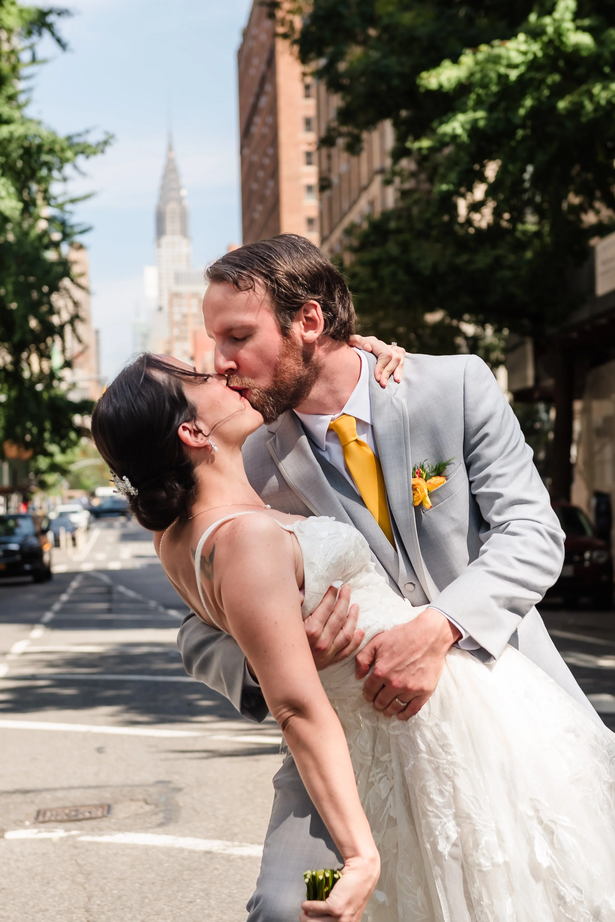Bride and groom wedding photo in front of Chrysler building, New York
