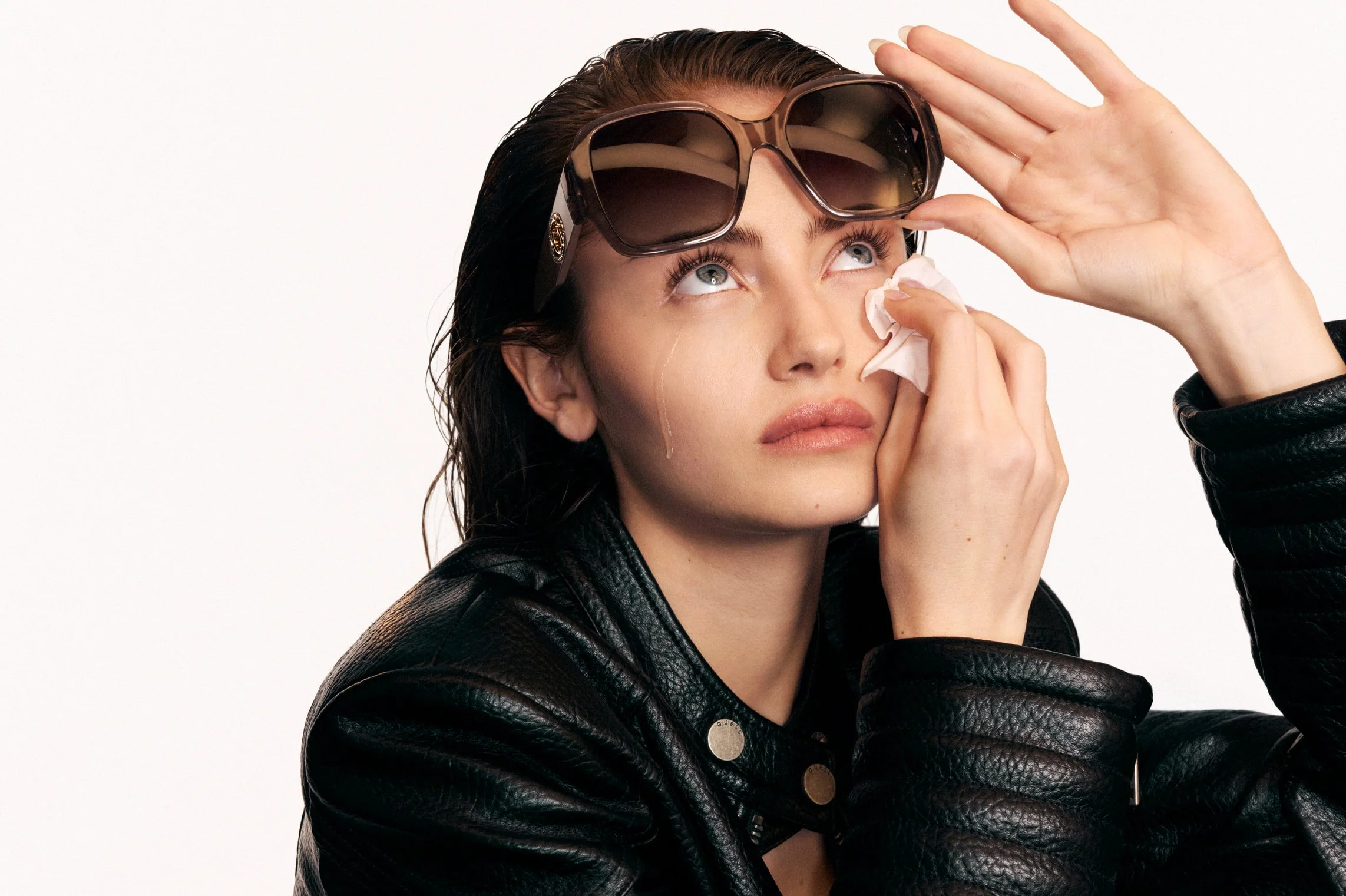 Leni Klum channels 90s soap-opera drama in GUESS eyewear campaign.