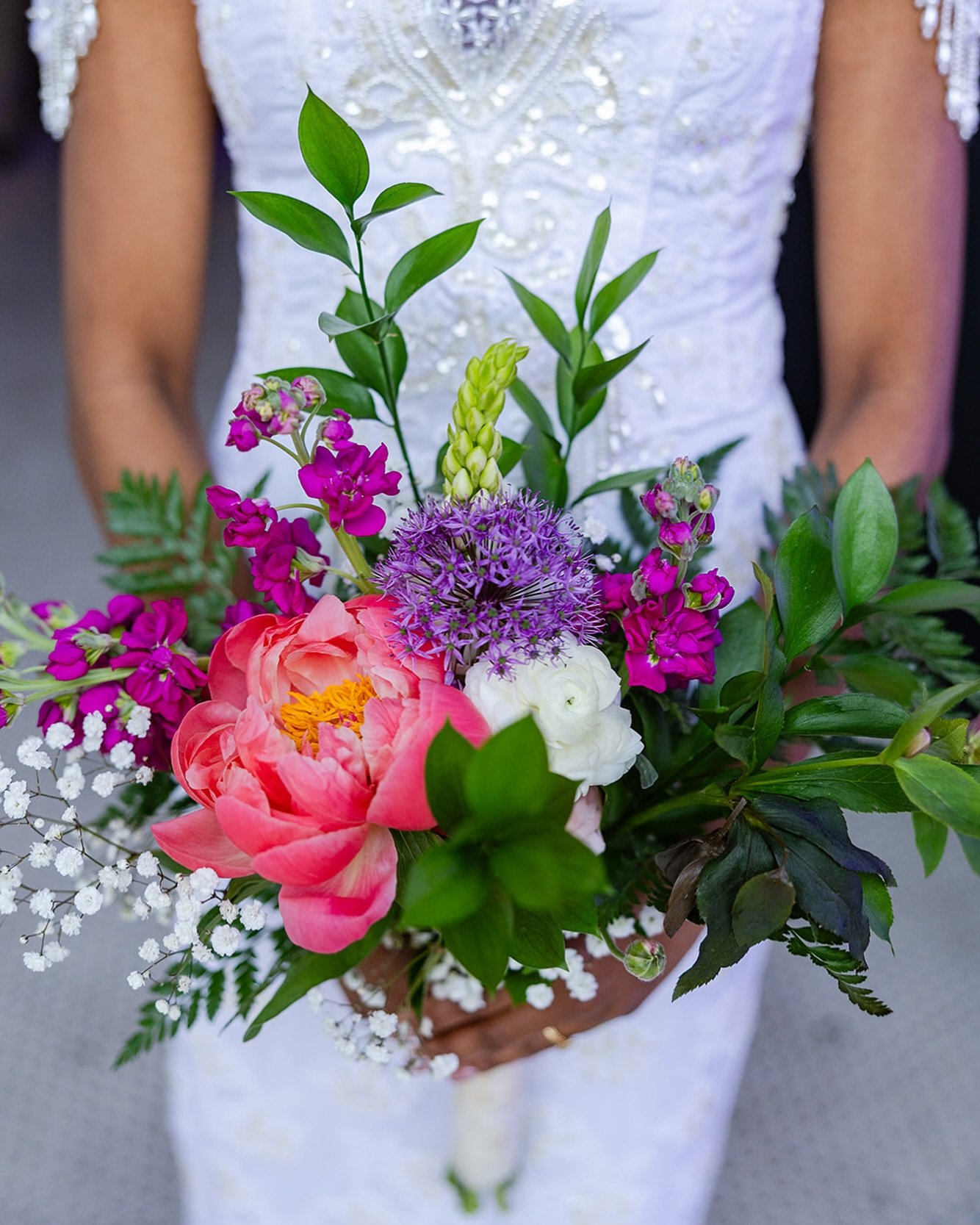 Shannon and Danny had the most stunning bouquets, and they were all made by the wedding party! I wish I could make flowers look that good (and keep them alive at that). Such vibrant colors and beautiful spring blooms for an equally vibrant and beauti