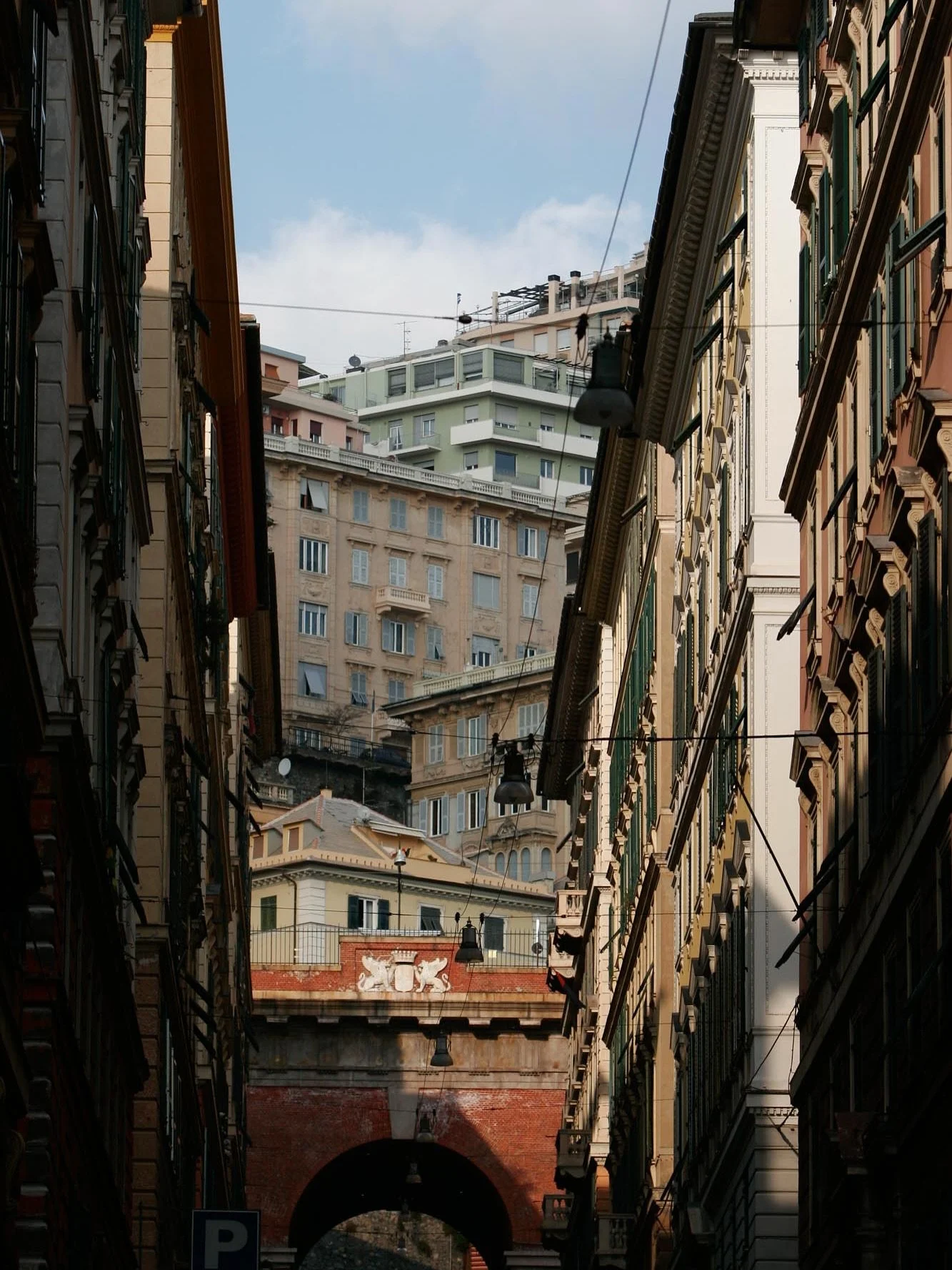 Genoa is an enchanting city – bewitching, bewildering, and beautiful. It was here that my wheels touched down in Italy for the first time, where Emilio met me at the airport, tan and beaming, took me by the hand and introduced me to all his fri