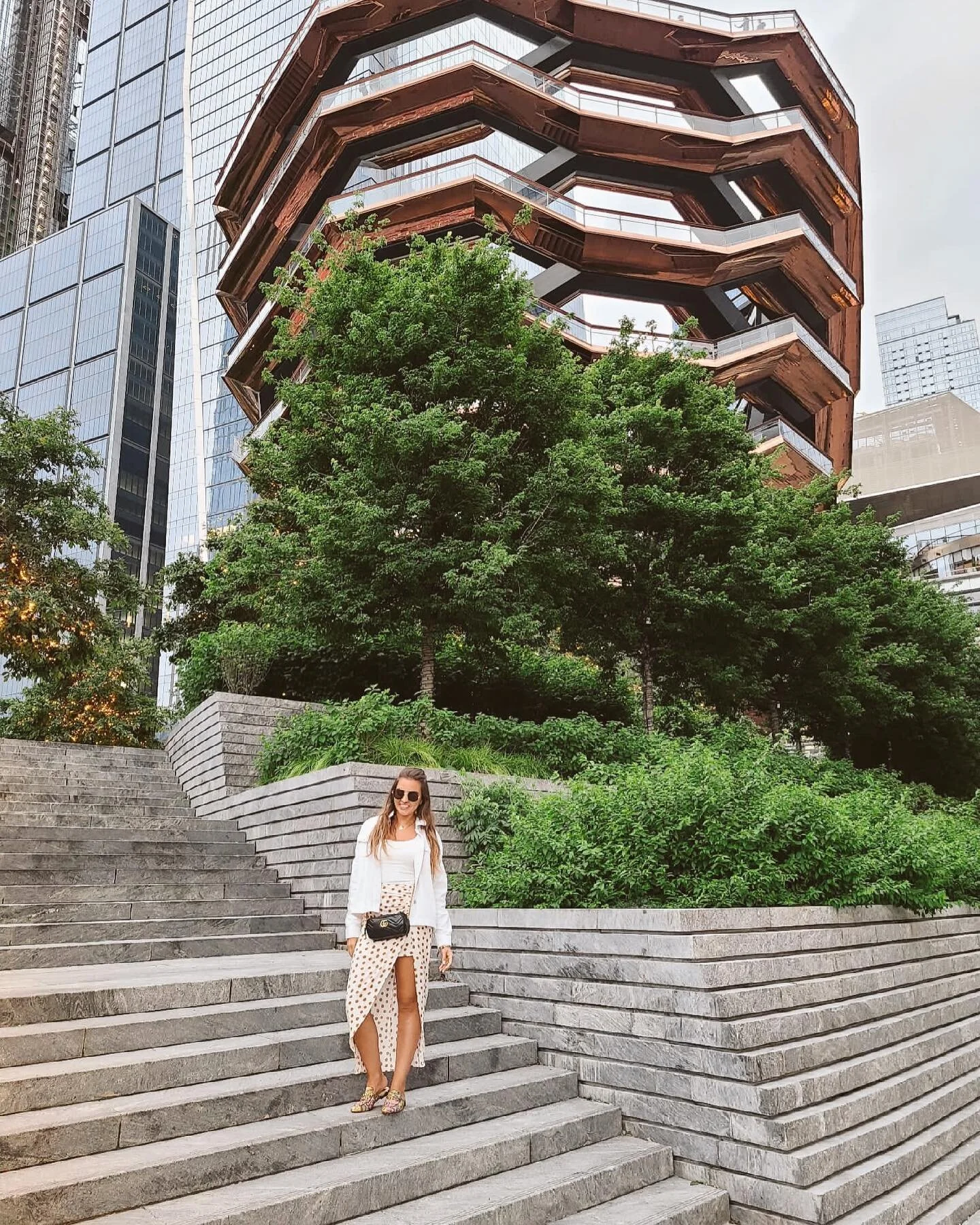 Style doesn&rsquo;t have to be overwhelming! Just adding some accessories and statement pieces to versatile piece like a white tank top. I paired this white tank top with a pocket dot skirt, added my favorite loafers and a black small bag. The key is