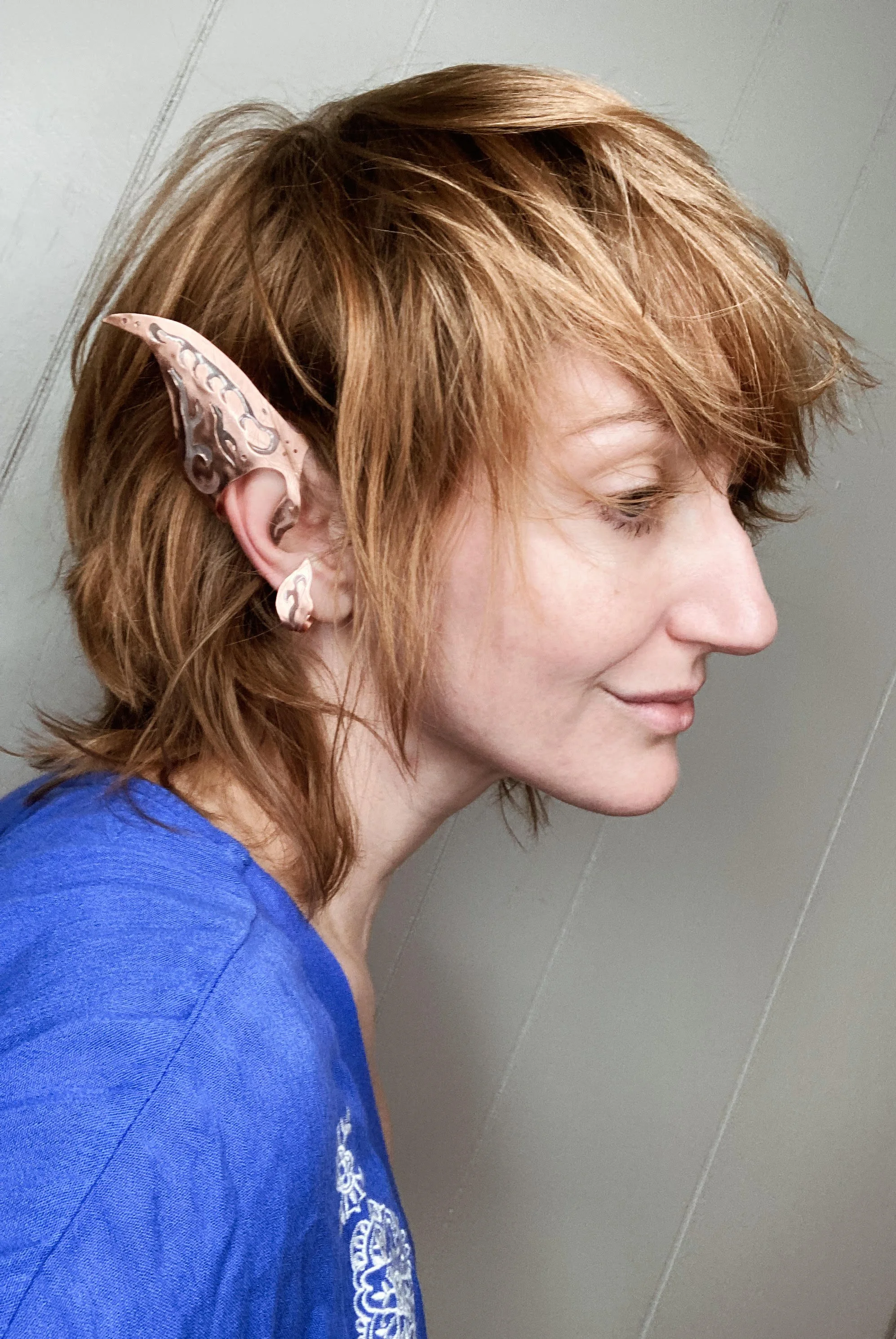 Wearing Elf Ear.jpg