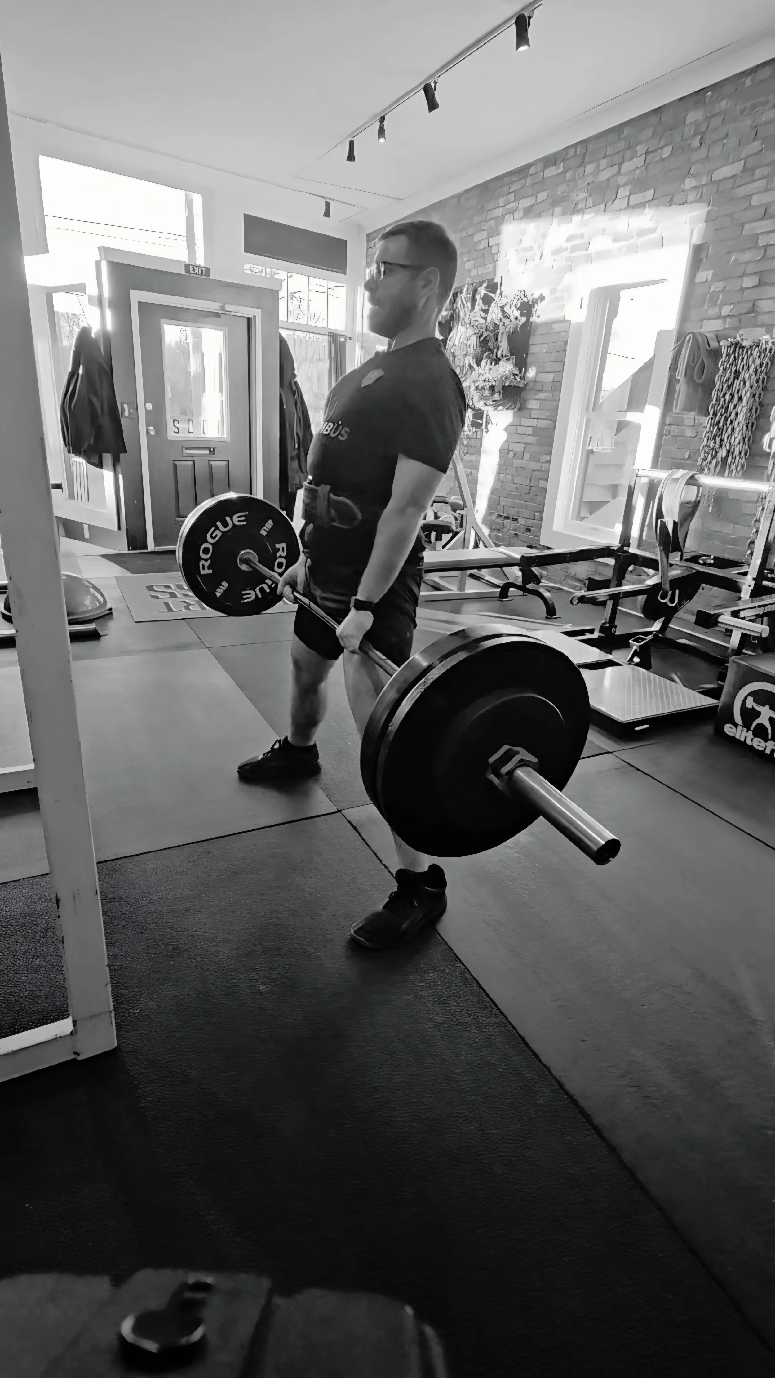 Personal training client performing a deadlift at Lionheart Fitness, a private strength training gym in Italian Village, Columbus, Ohio.