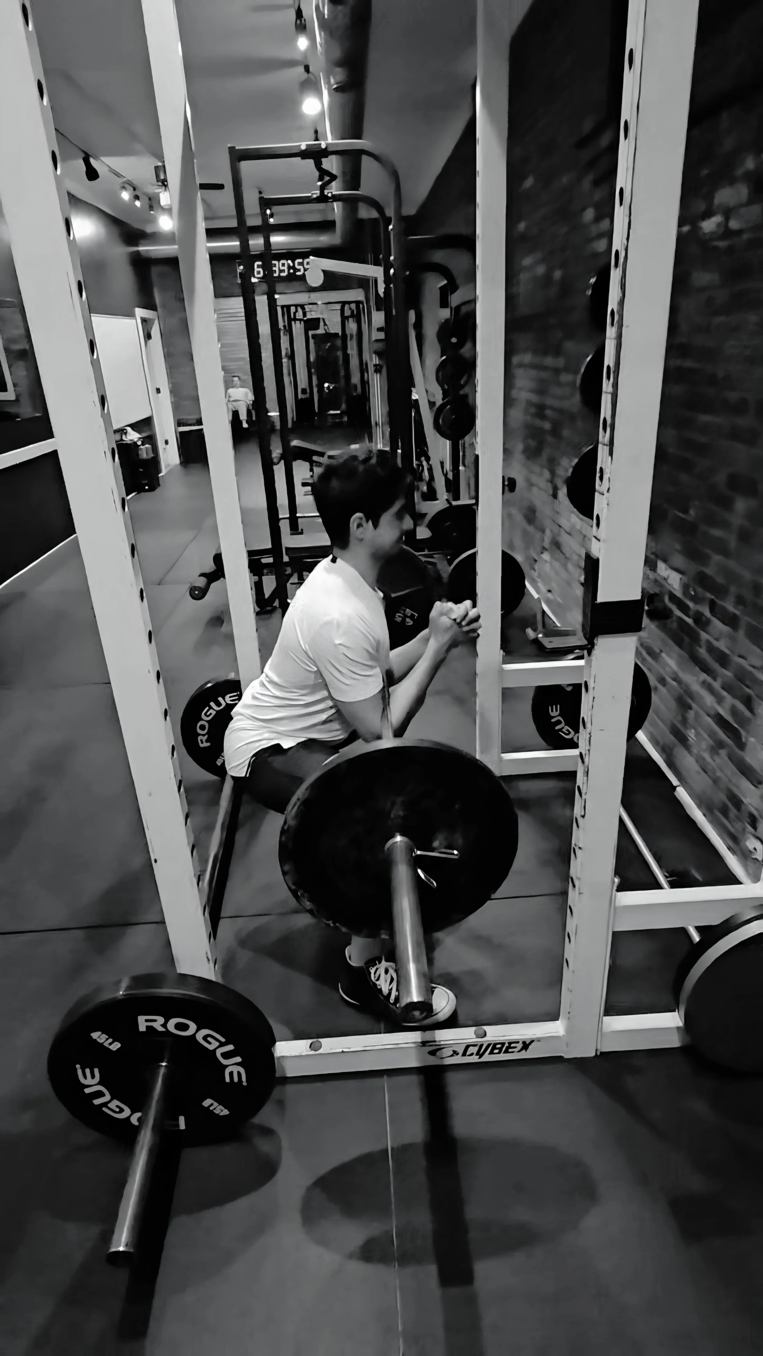 Small group strength training session at Lionheart Fitness in Columbus, Ohio, focused on proper squat technique and progressive overload.