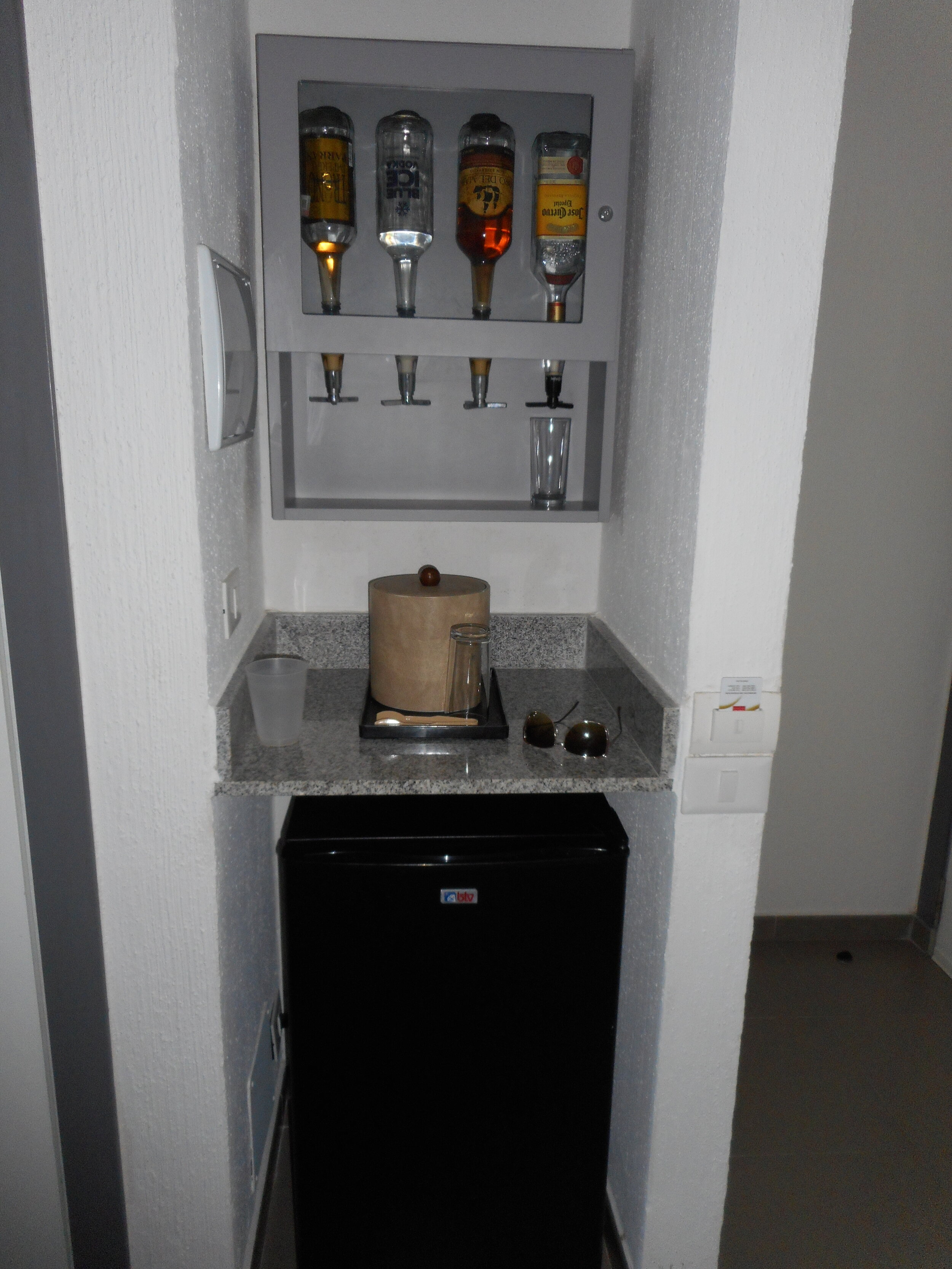 Our in-room bar, complete with plenty of water, pop, and juice in the fridge!