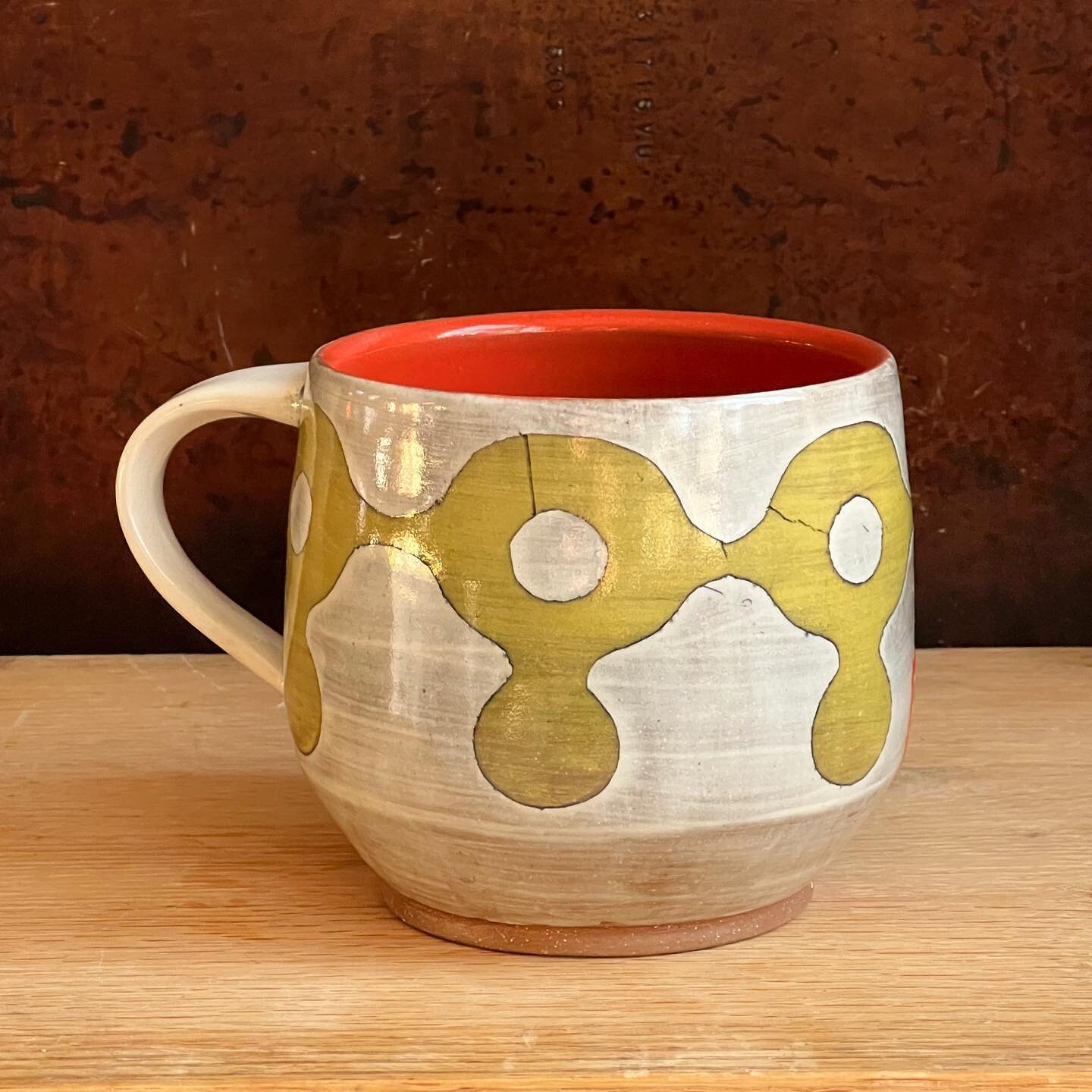 I&rsquo;ve been working on some new stuff, and have arrived at a place I&rsquo;m very happy with. You can see more in my shop update, tomorrow at noon. 🤗
.
.
#handmademug #mug #coloredslip #printonclay #graphicclay
