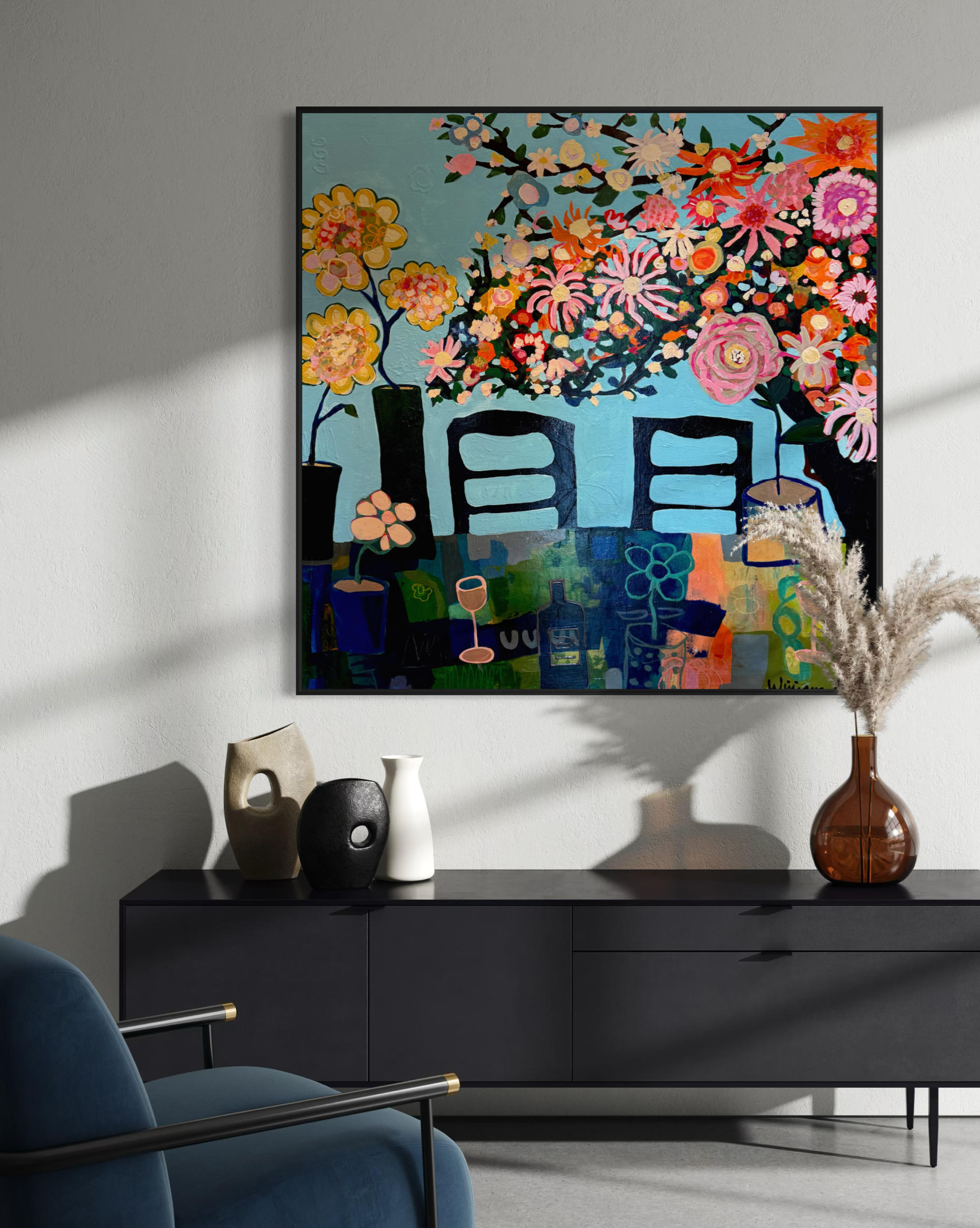 One Side of Summer by Elizabeth Williams displayed above a black sideboard in a sunlit modern interior.