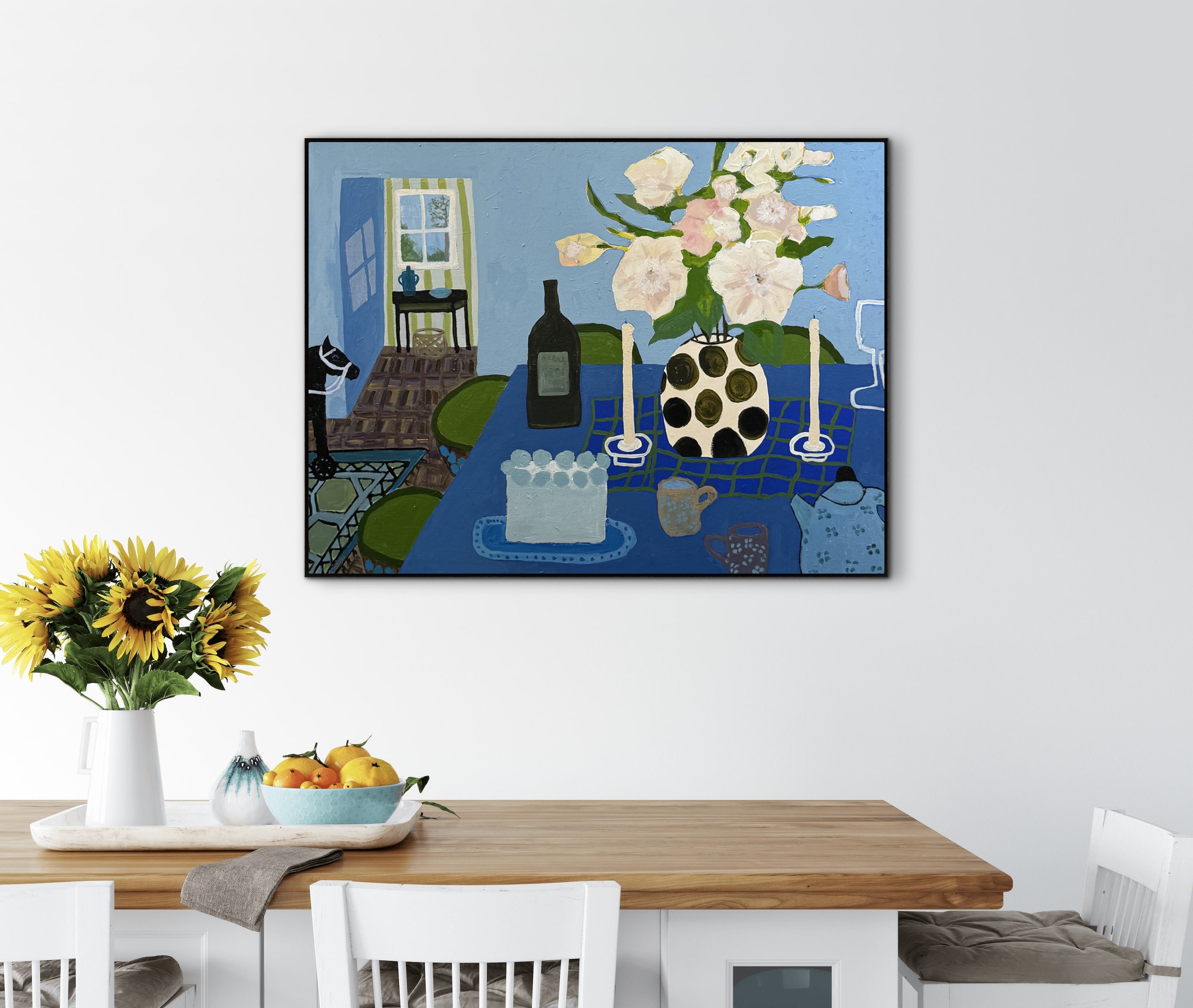 Before the Cake, original contemporary still life painting featuring a blue table setting with candles, flowers, a wine bottle, and an open doorway.