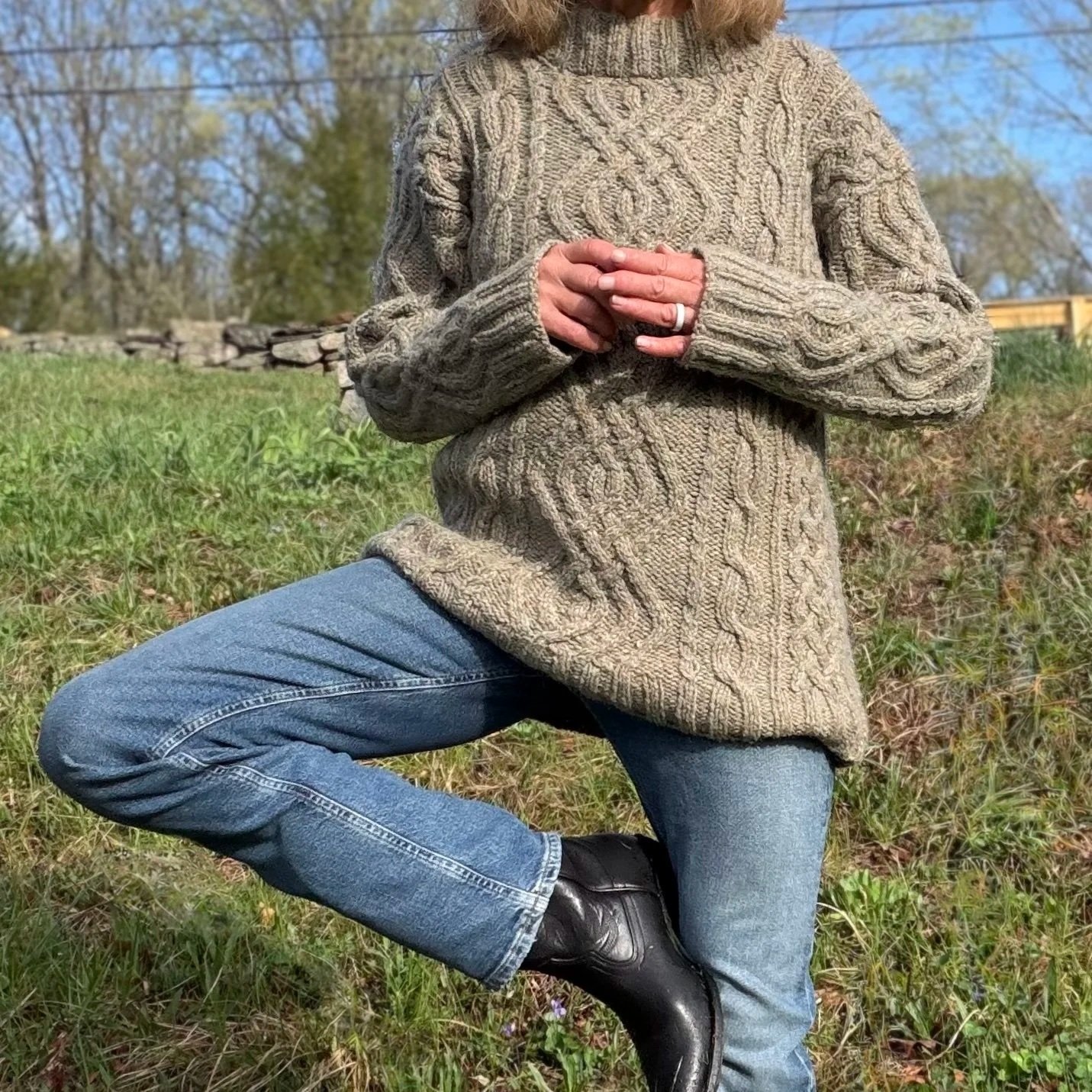Beautiful unisex cable sweater that knits up quickly with rugged Aran weight yarn.