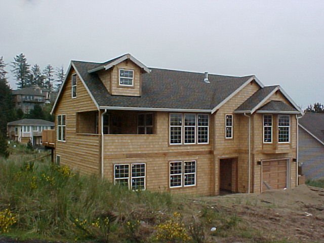 We are located about an hour from the Pacific Ocean and we LOVE driving down the coastline and seeing all of the beautiful Cedar homes. These two home feature Eastern White Cedar. One picture is of a new construction home and the other one is after t