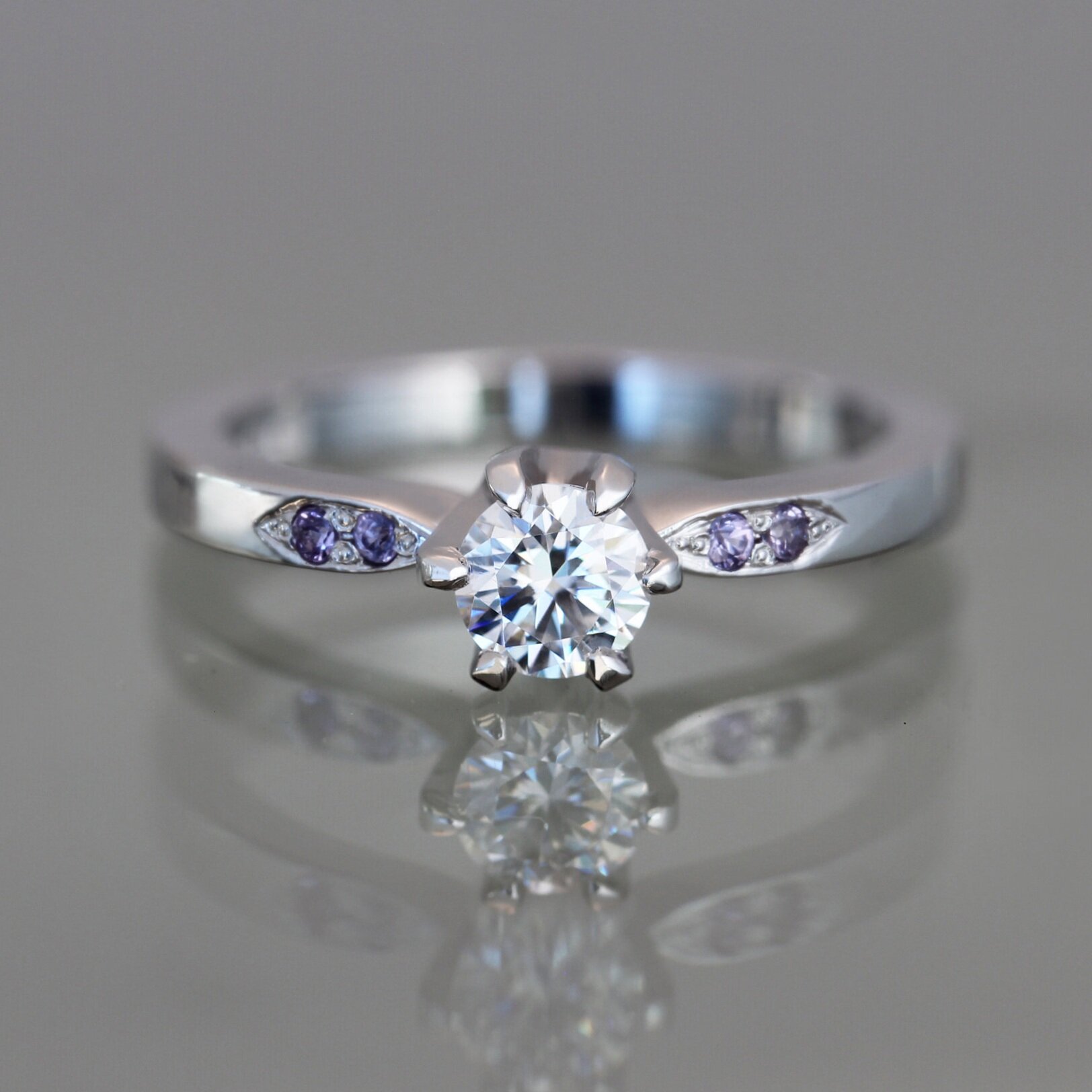 Platinum+Band+with+Moissanite+6+Claw+Tulip+Setting+with+Purple+Sapphire.jpg
