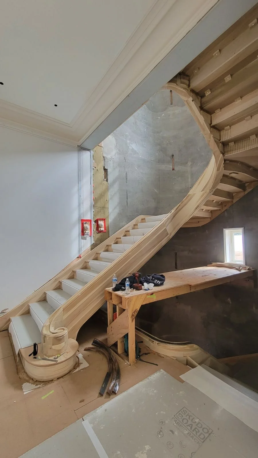 Paint grade strings, Oak treads, on the winding spiral stair