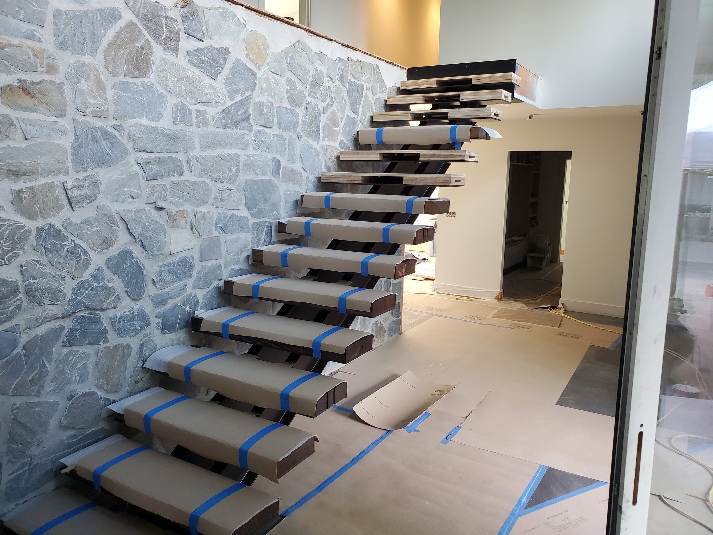 Floating Stairs, Carried on two I-beams, Reclaimed Fir Treads, Bona Finish
