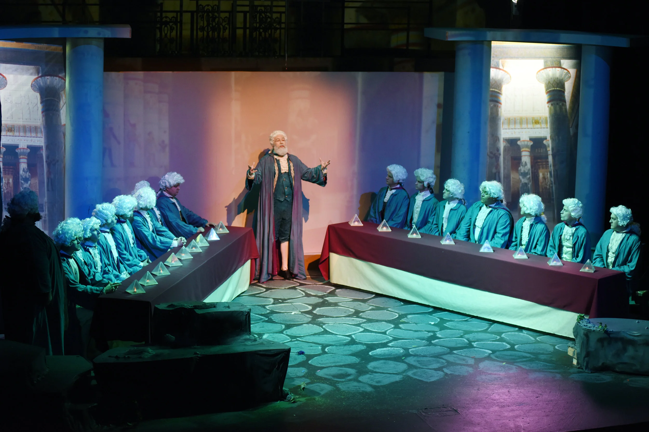 A council meeting surrounded by columns