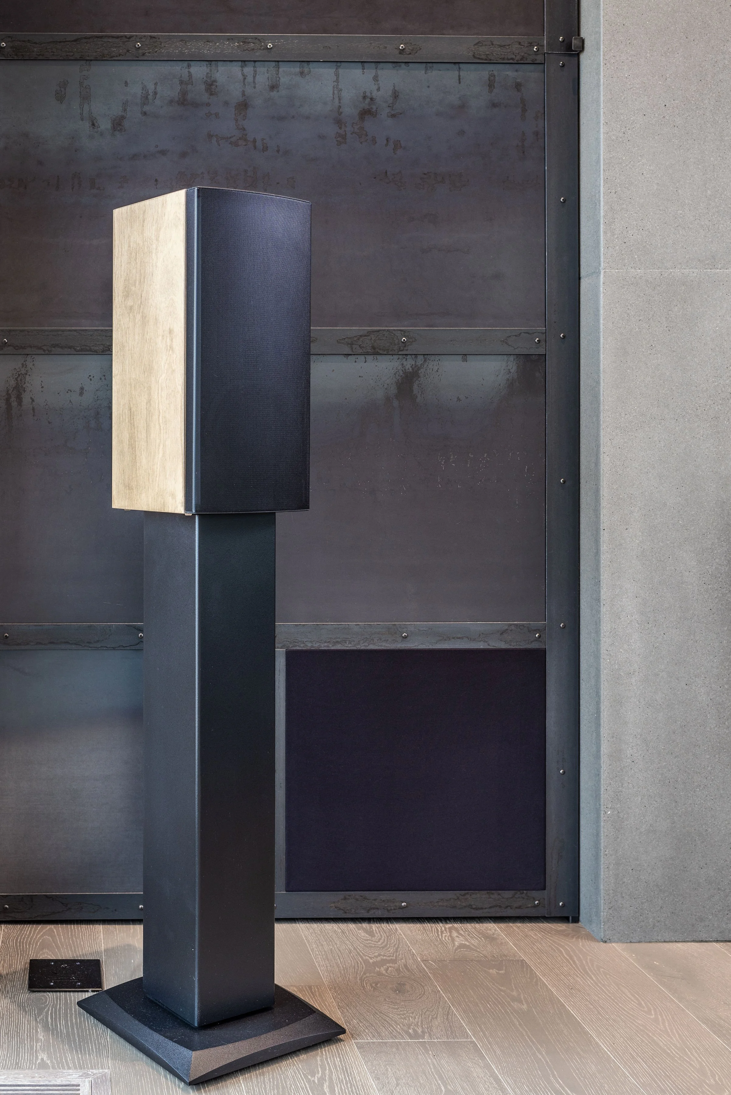Custom metalwork and concrete fireplace surround