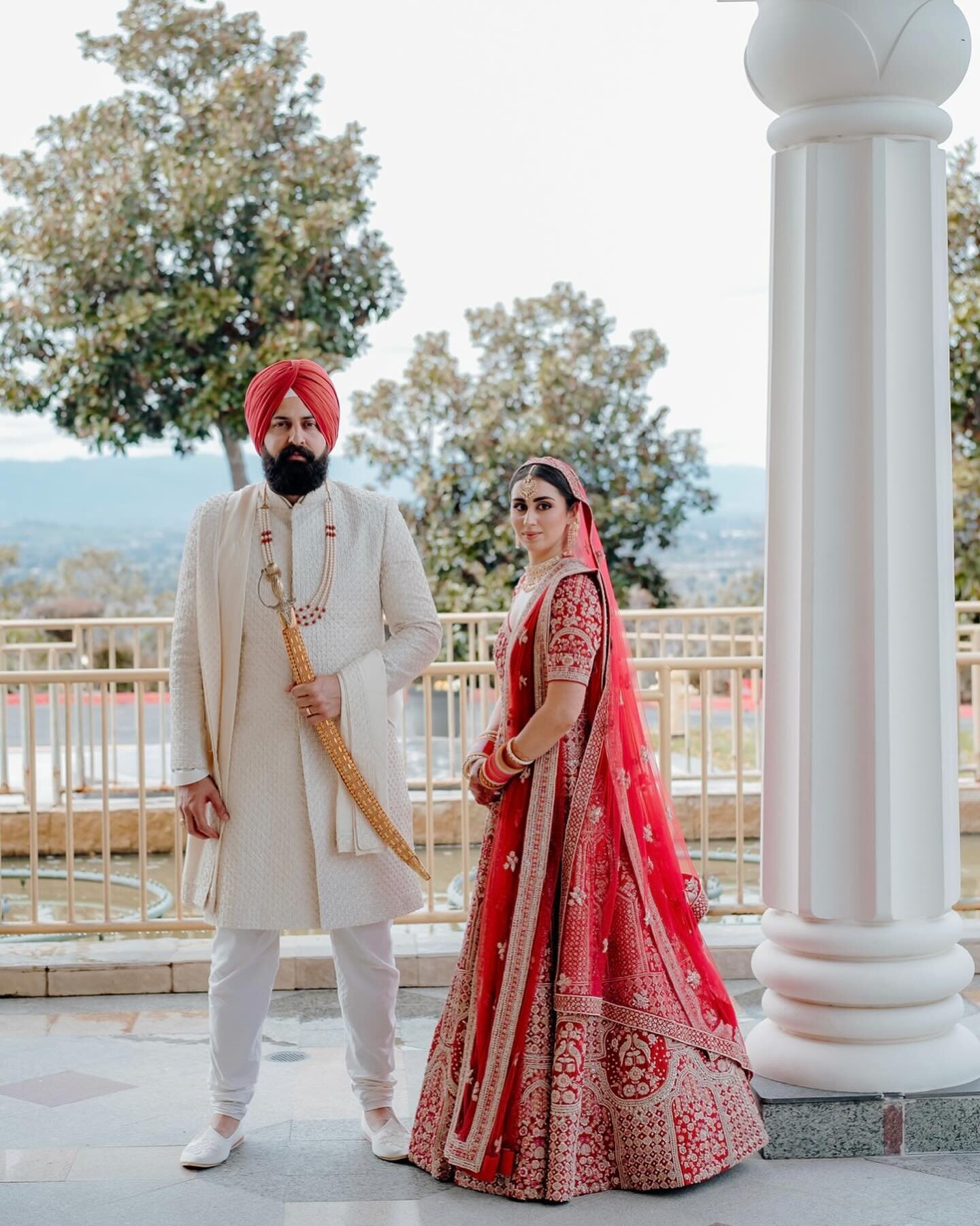 Sachi and Sean are a radiant fusion of Sikh and Persian love, adorned in elegance. Saachi shines in the dress &lsquo;Oshun&rsquo; embodying the goddess of divinity, while Sean graces an ivory sherwani. With a union as celestial as their attire, this 