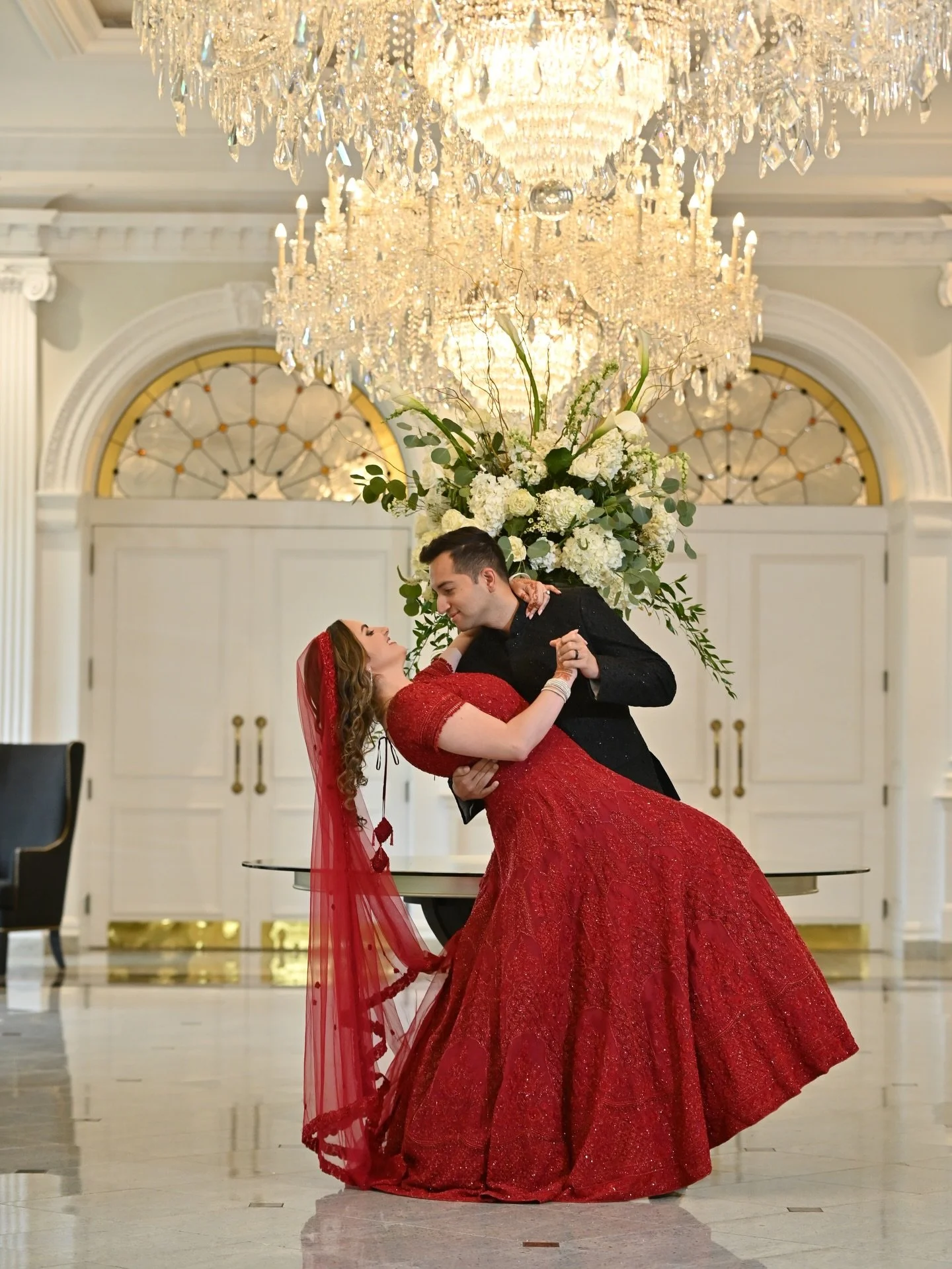 Crystal hearts, radiant souls &mdash; Sanam and Ali carry an effortless sweetness that has us mesmerized. In her bespoke scarlet gown and his black embellished jacket, their fusion wedding is both striking and beautifully their own.

Bride: @sanamami