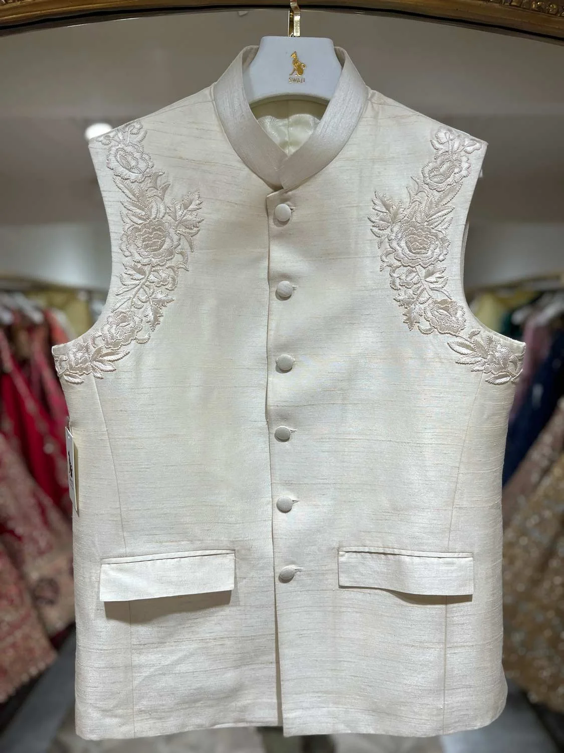 MJDPV03-44: $1100
- Ivory jodhpuri vest with floral applique design.