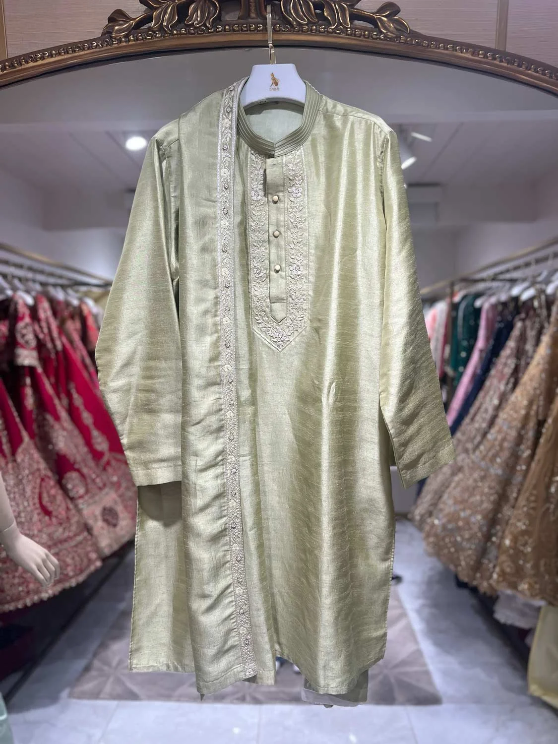 MKUS01-44: $850
- Light green silk men's kurta with stole. 100% hand embroidery.