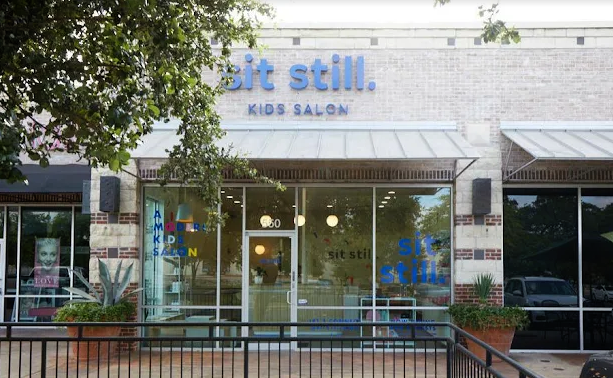 Sit Still Kids salon front desk in Austin, Texas.