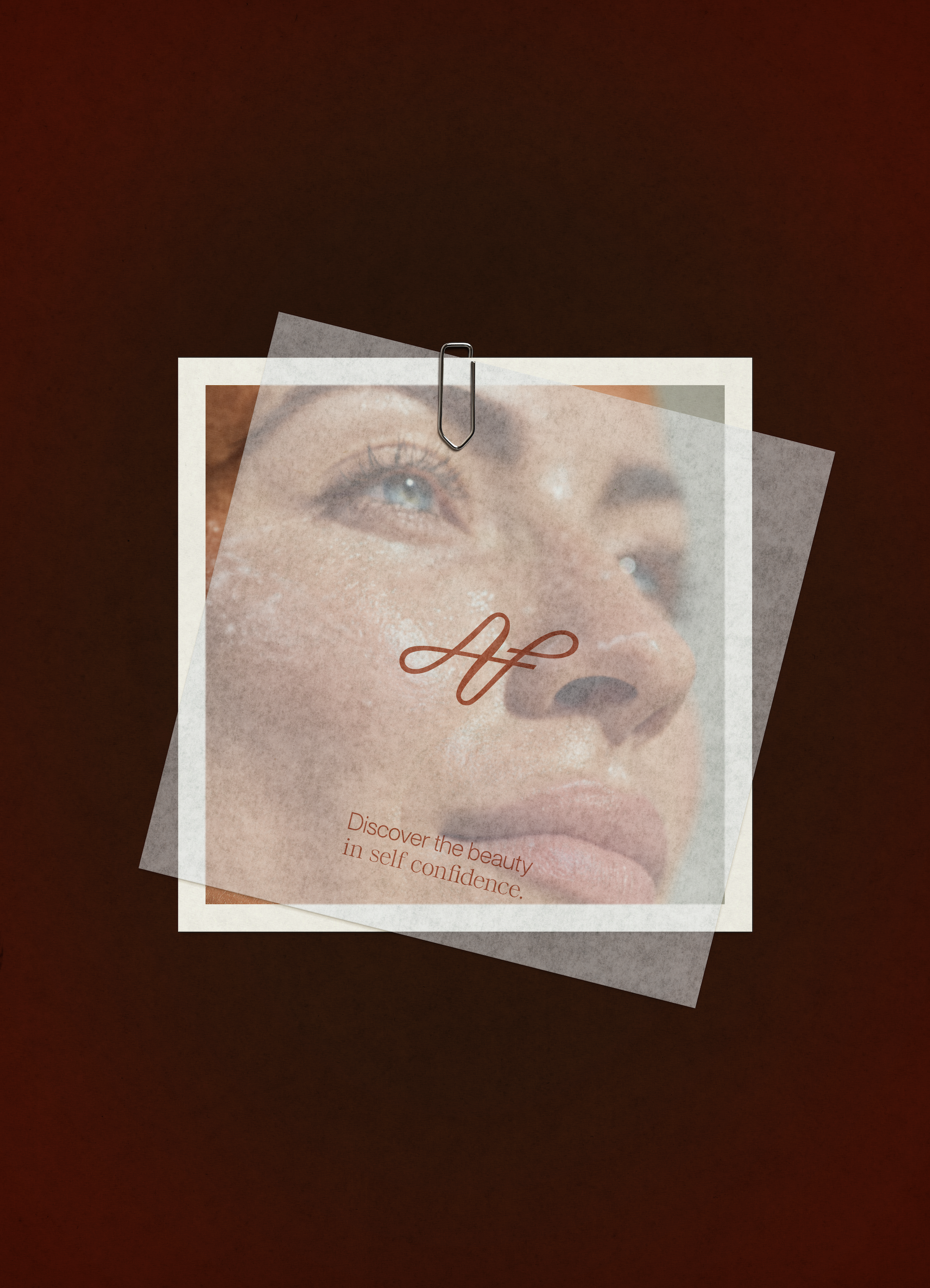 A close-up of a promotional flyer with a woman's photograph, featuring the words "Discover the beauty in self confidence" and a decorative initials "A" in cursive.