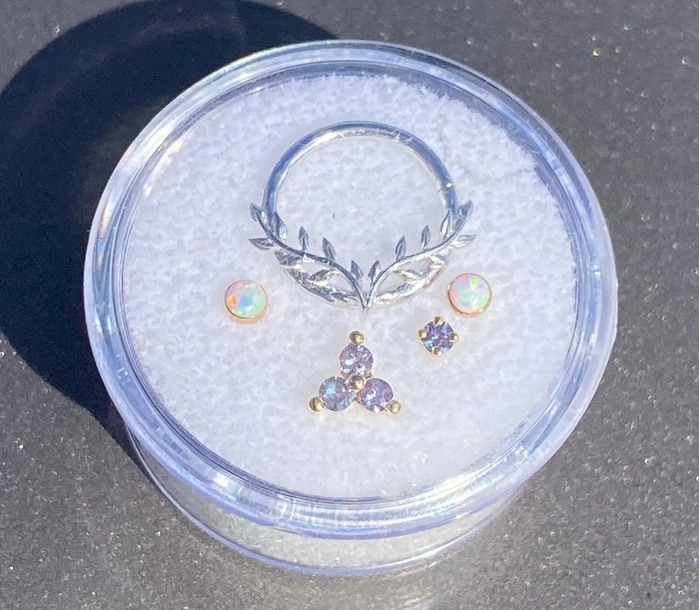 When it comes time for your wedding you want to be as fancy as possible.
That means changing up your whole jewelry setup.
Alexandrite and yellow gold trinity, and single prong set gem stud- @industrialstrength 
White opal and rose gold gem stud- @n