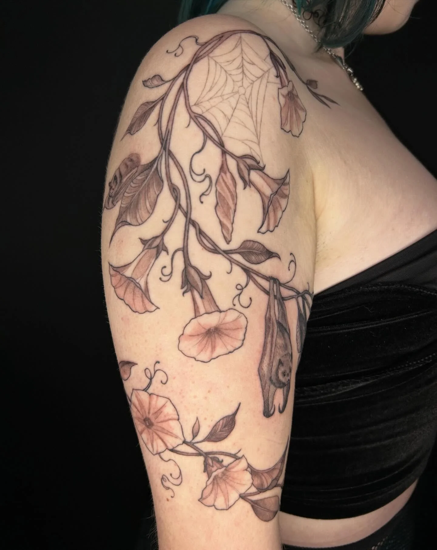 I love when people get darker/creepier florals it gives me life👏🏽👏🏽👏🏽can you find the bats👀 (lines are healed, shading is fresh) 

#tattooartist #michigantattooartist #femaletattooartist #blackwork #blackworktattoo