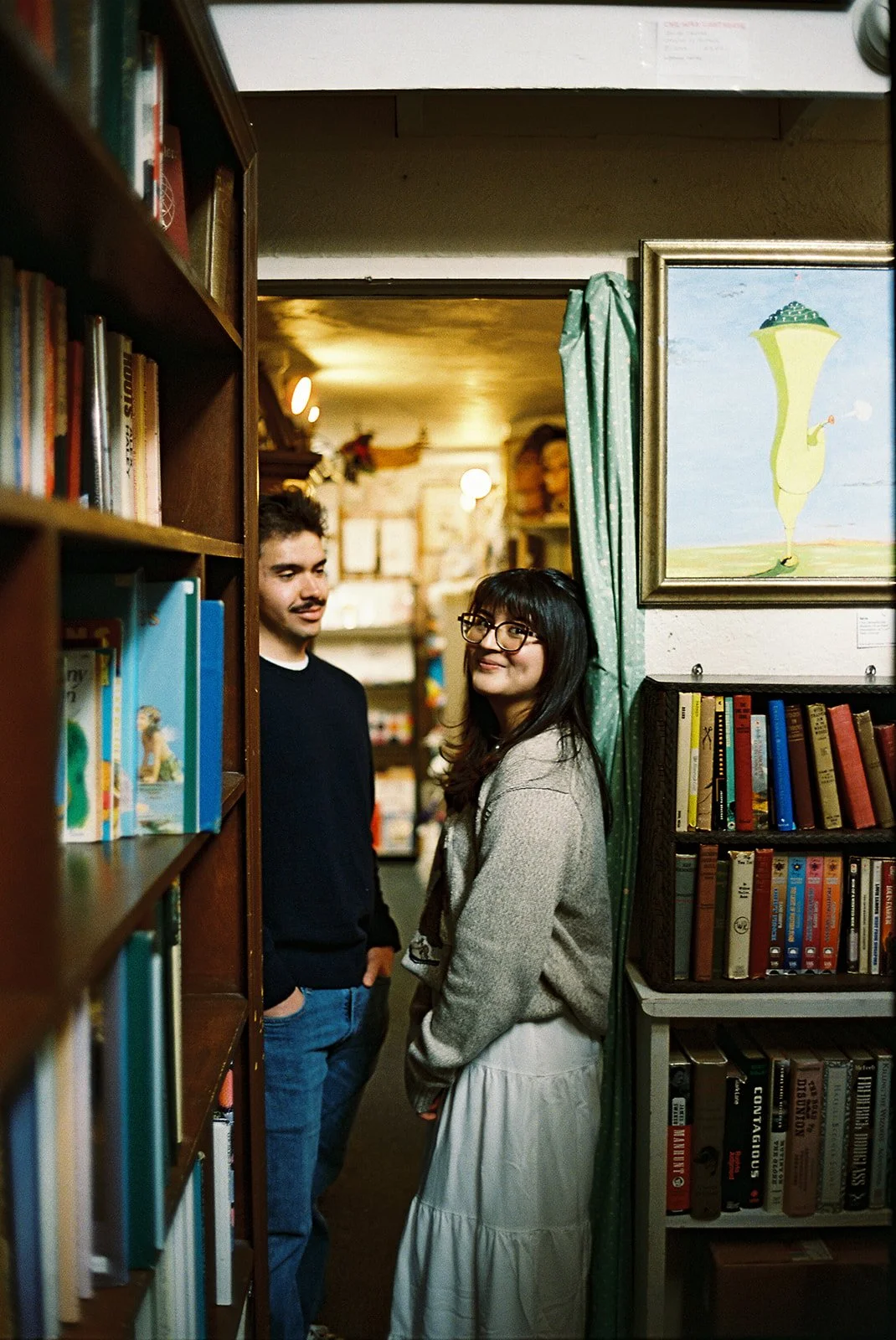 Engagement Session shot completely on film at a record store with a vintage Volkswagen Beetle