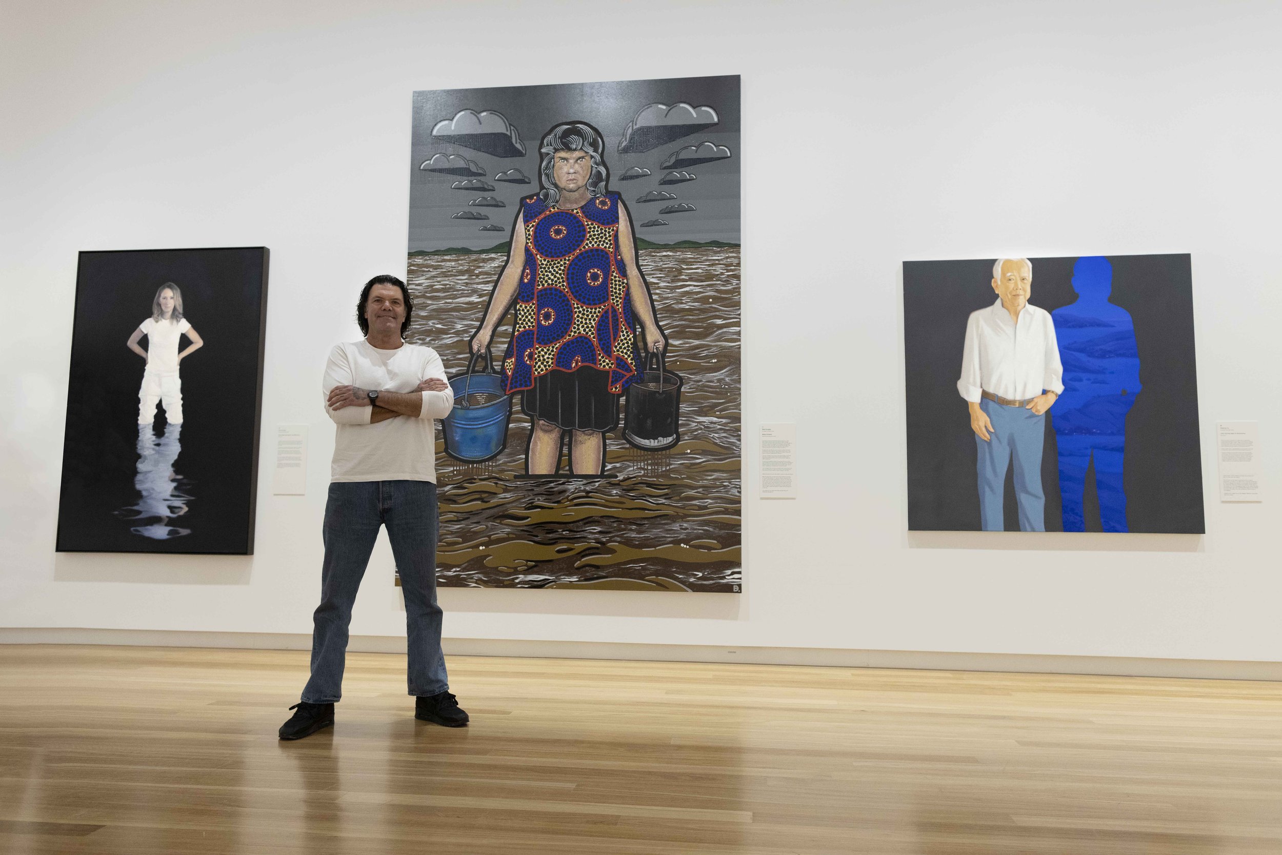 Blak Douglas, 2022 Archibald Prize winner. Left to right: Knee-deep (Lisa McCune), Yvonne East; Moby Dickens, Blak Douglas; John and the light of ultramarine, Dapeng Liu. Photo: Andy Chappell.