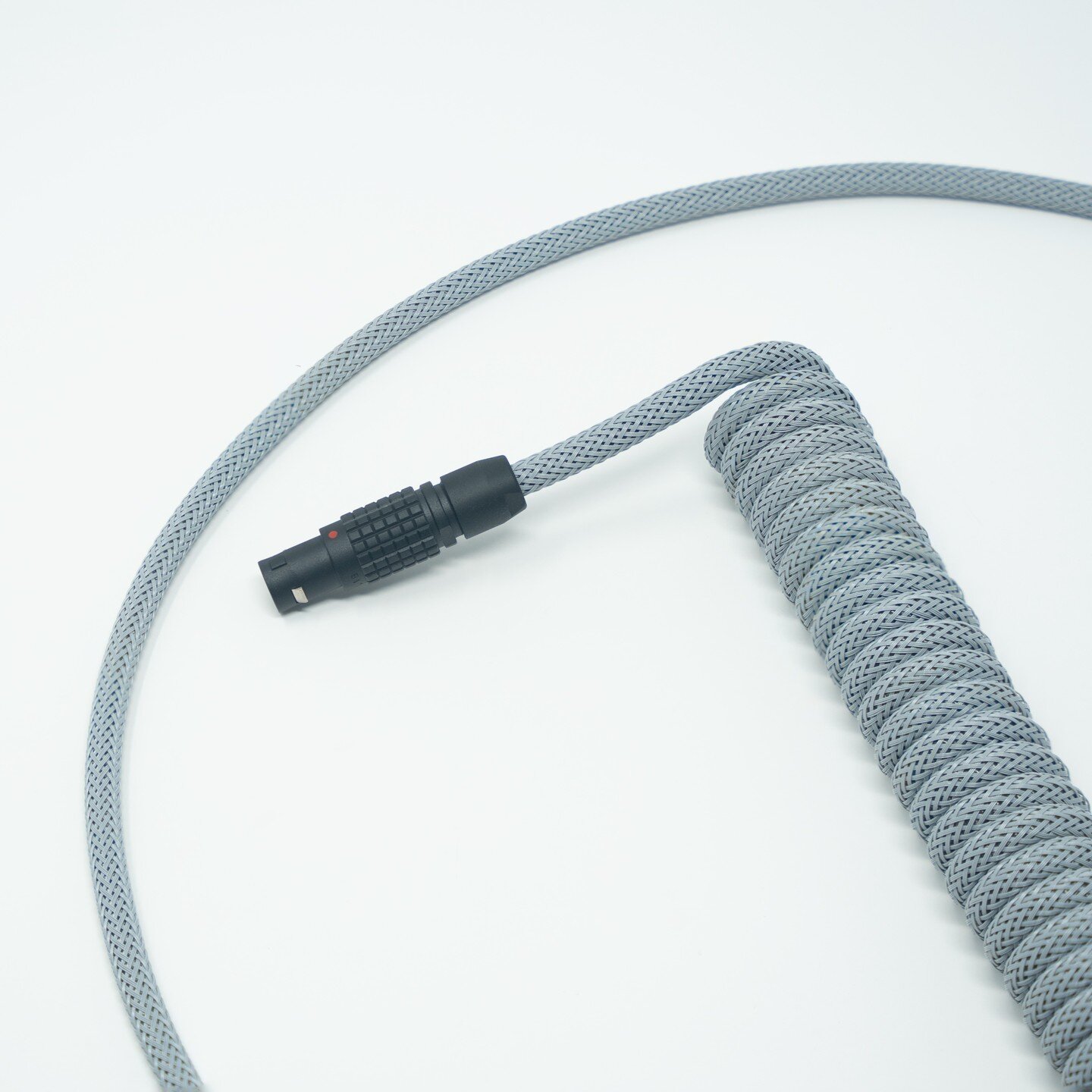 Another one ... 

Another fantastic classic cable rocking a charcoal base para and fabulously saturated Aluminum Grey MDPC-X.

It's almost silly to refer to a monochrome shade as &quot;saturated&quot; but paired with that black 1B (larger) genuine LE