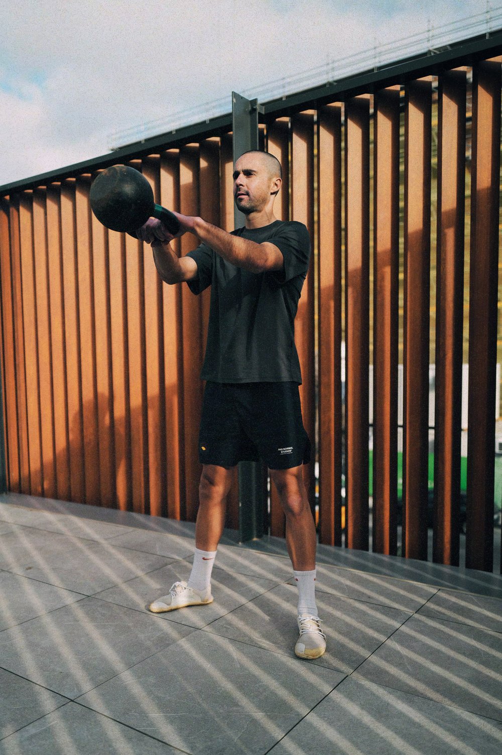  Step-by-step guide on executing a perfect kettlebell swing for enhancing cyclist's power and explosiveness. 