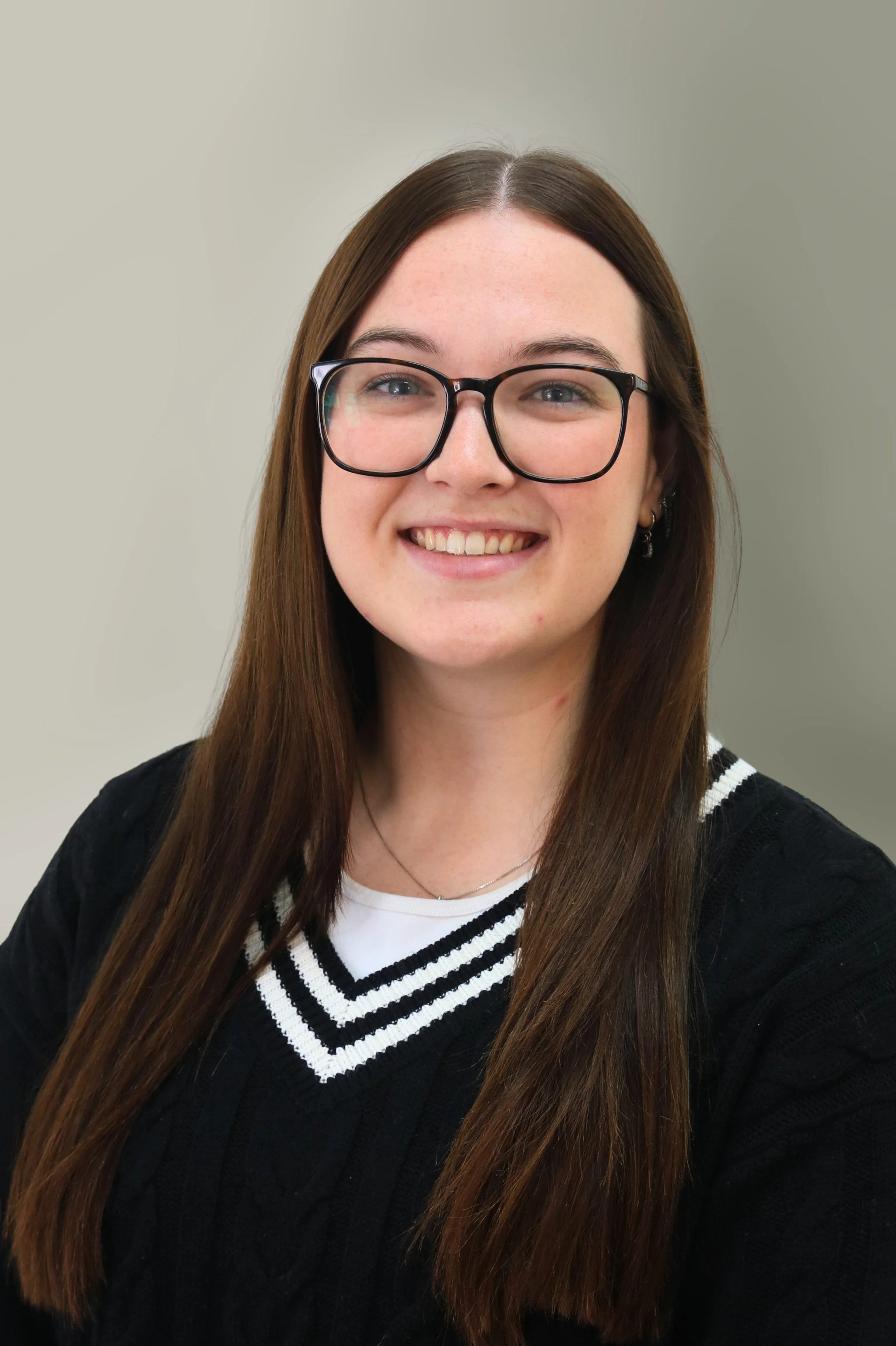 Ashley Osborne, best client experience coordinator who greets clients and creates the best experience