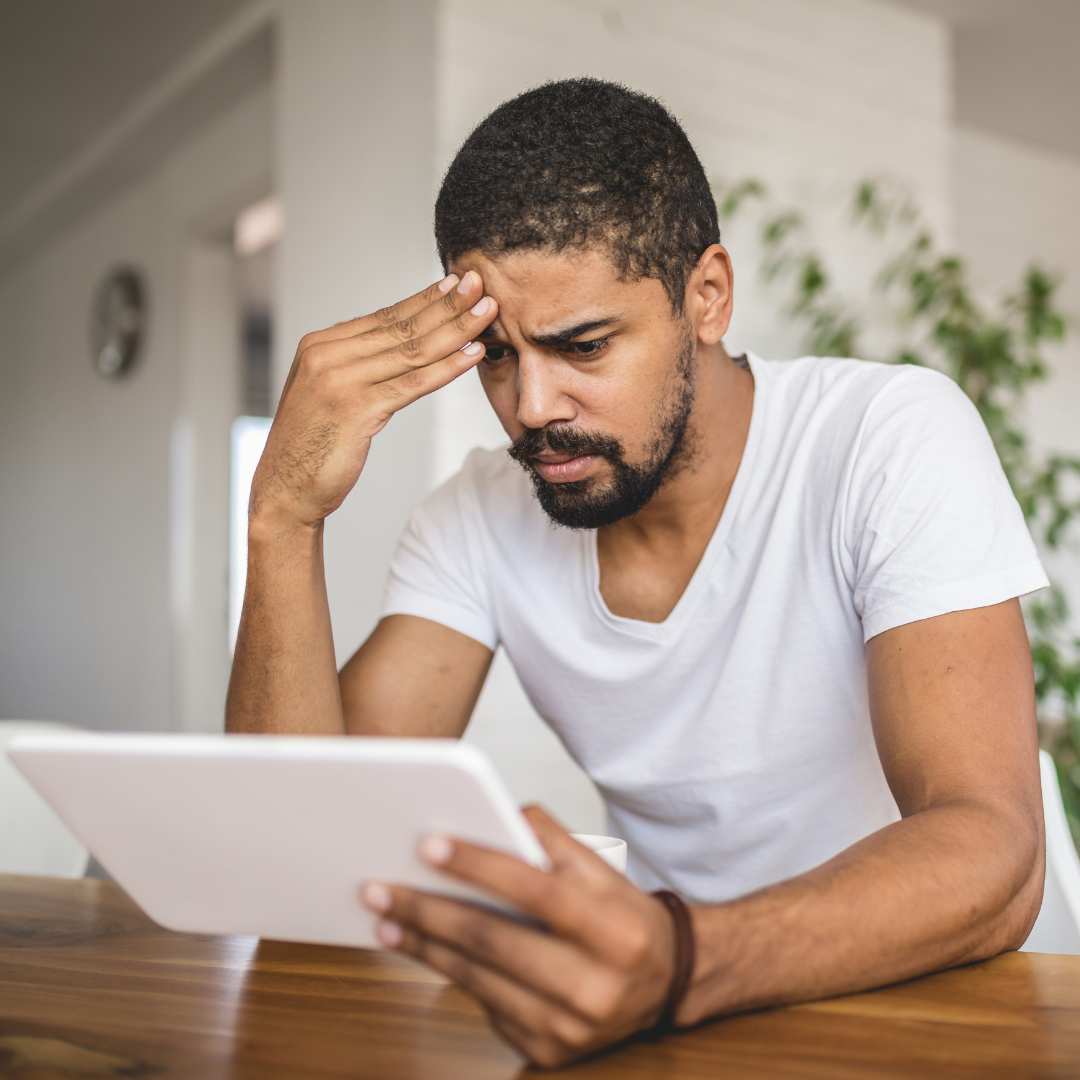 Man is nervous looking at answers online