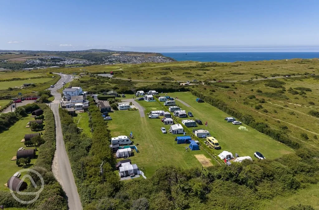 aerial-view-of-the-pods-and-grass-pitches-with-optional-electric.jpg