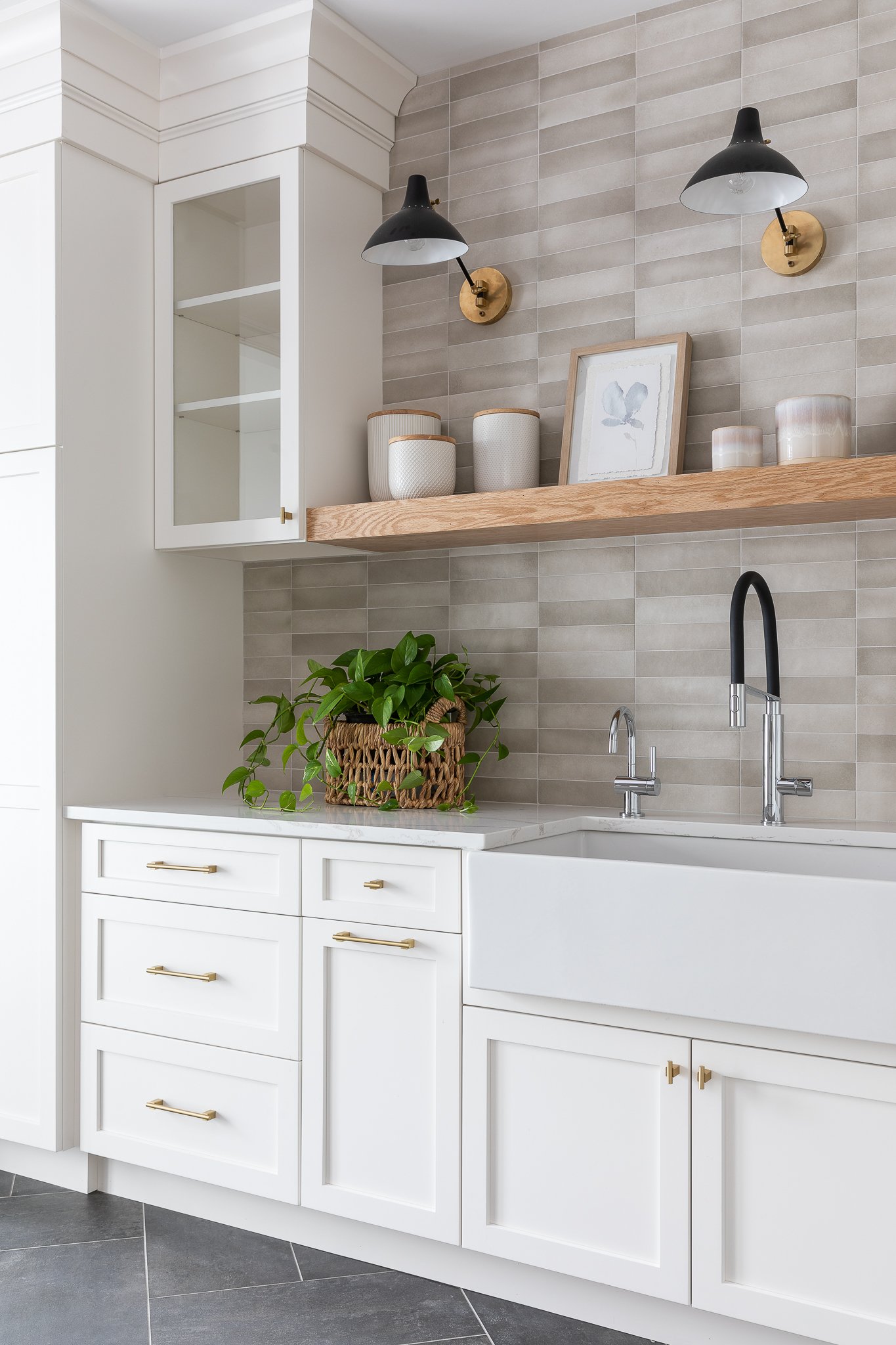 Little moments make a big statement! 
.
.
.
Photo @christykosnicphotography 
#interiordesign  #architecturelovers  #details #tilebacksplash #pulldownfaucet #architecturephotography #customcabintery #studio360llc #lighting