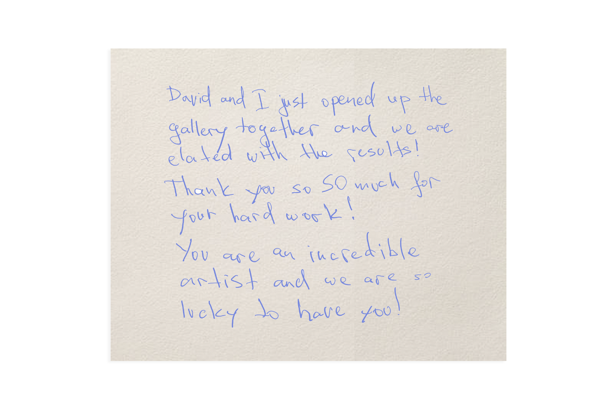 handwritten note in blue ink from a couple the day they opened their wedding gallery