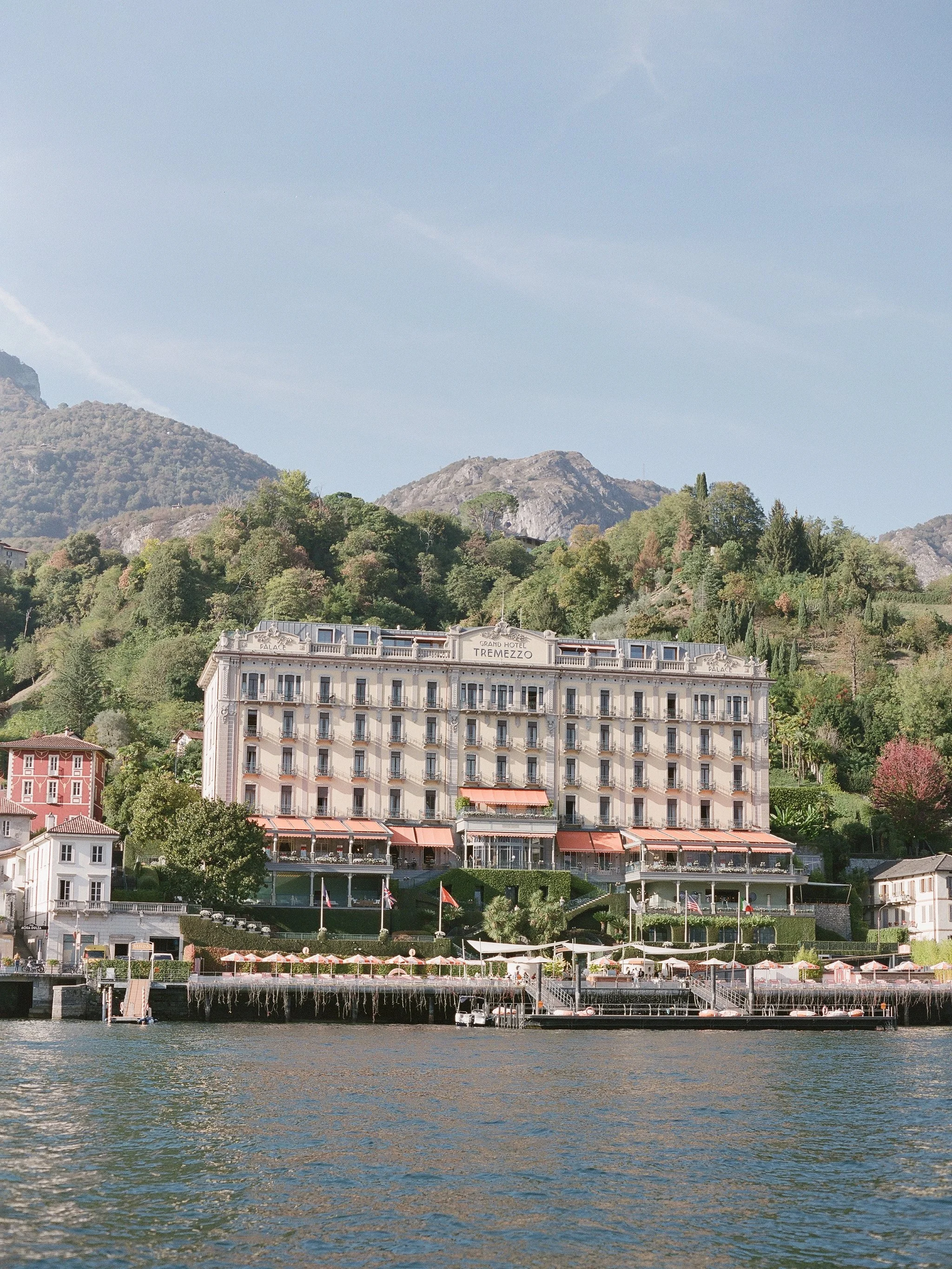 grand hotel tremezzo seen from the water, lake como italy · wedding and elopement venue · film photography by radostina boseva