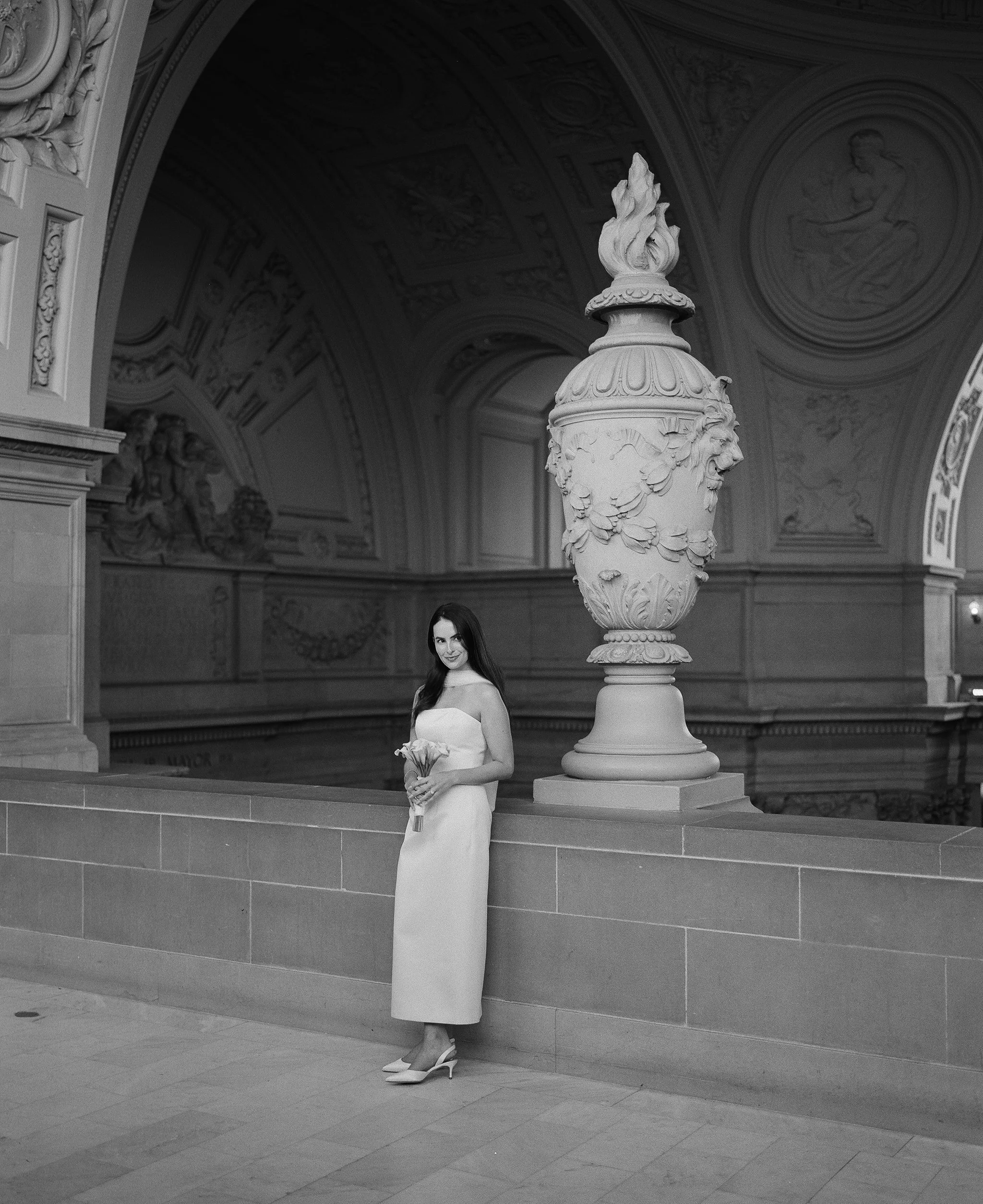 elegant bride in a minimalist column dress at san francisco city hall · civil ceremony style · documentary film photography by radostina boseva