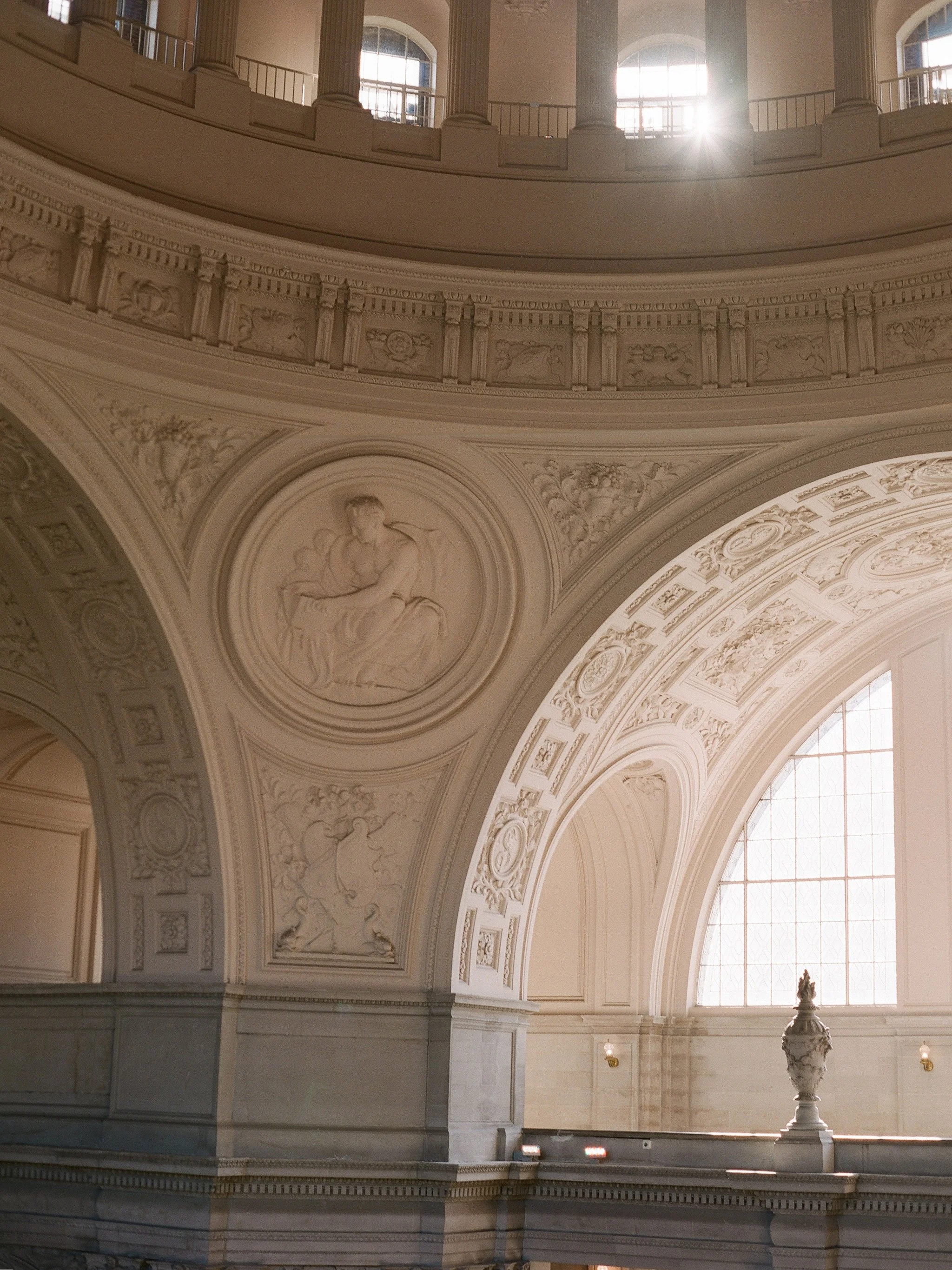 San Francisco City Hall rotunda — ornate relief arch and dome with sunlight, photographed on film by Radostina Boseva
