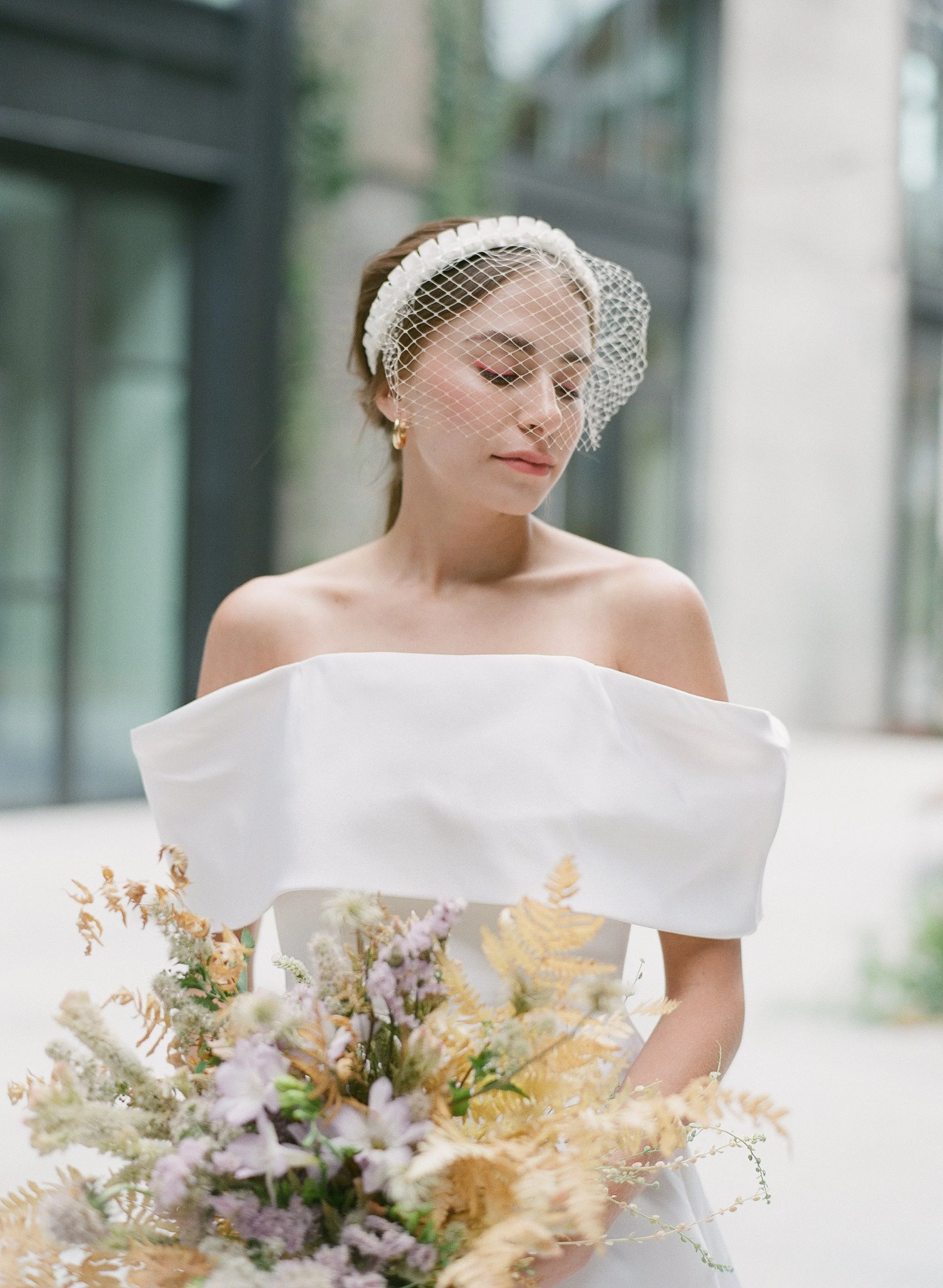 Bride portrait with birdcage veil and bouquet in natural light — film wedding photography, Los Angeles