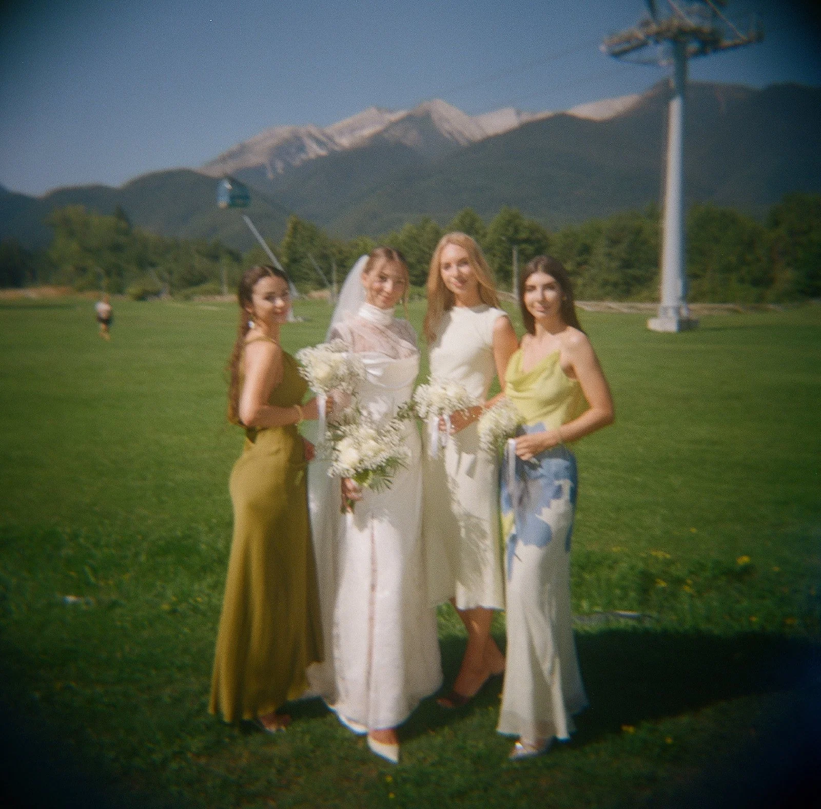 Documentary portrait of bride and friends at mountain wedding in Bulgaria — film photography by Radostina Boseva